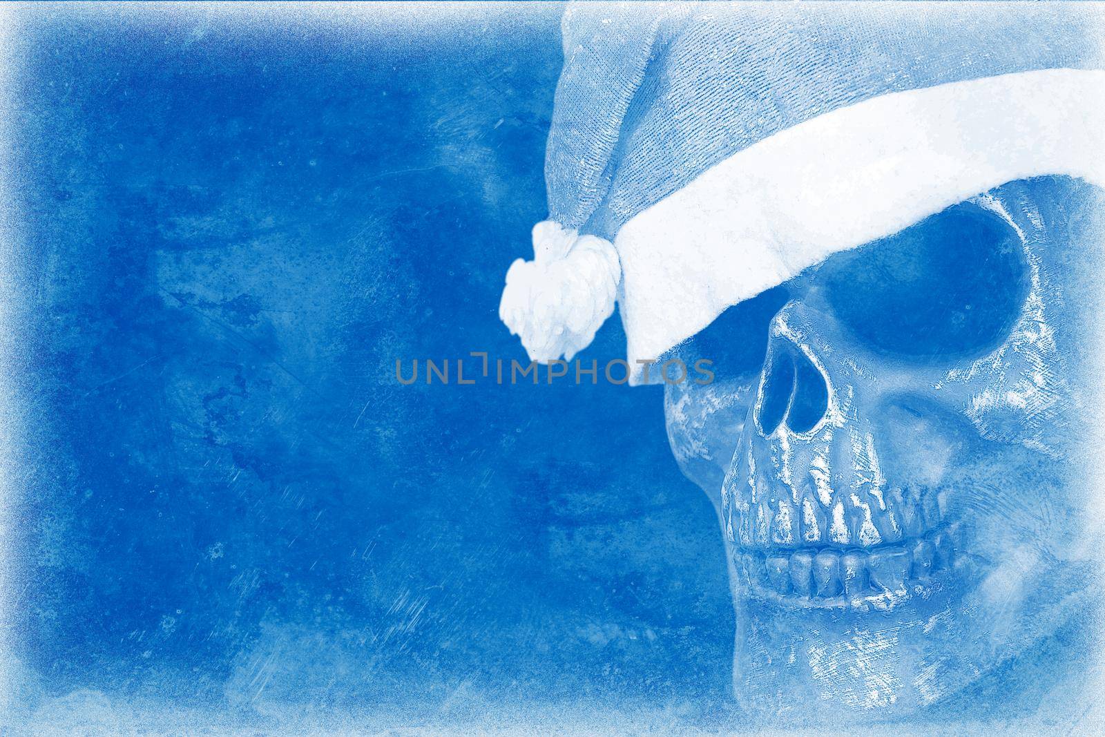 Stylized cold background depicting the skull of the fairytale character Santa Claus in a hat and blue tones