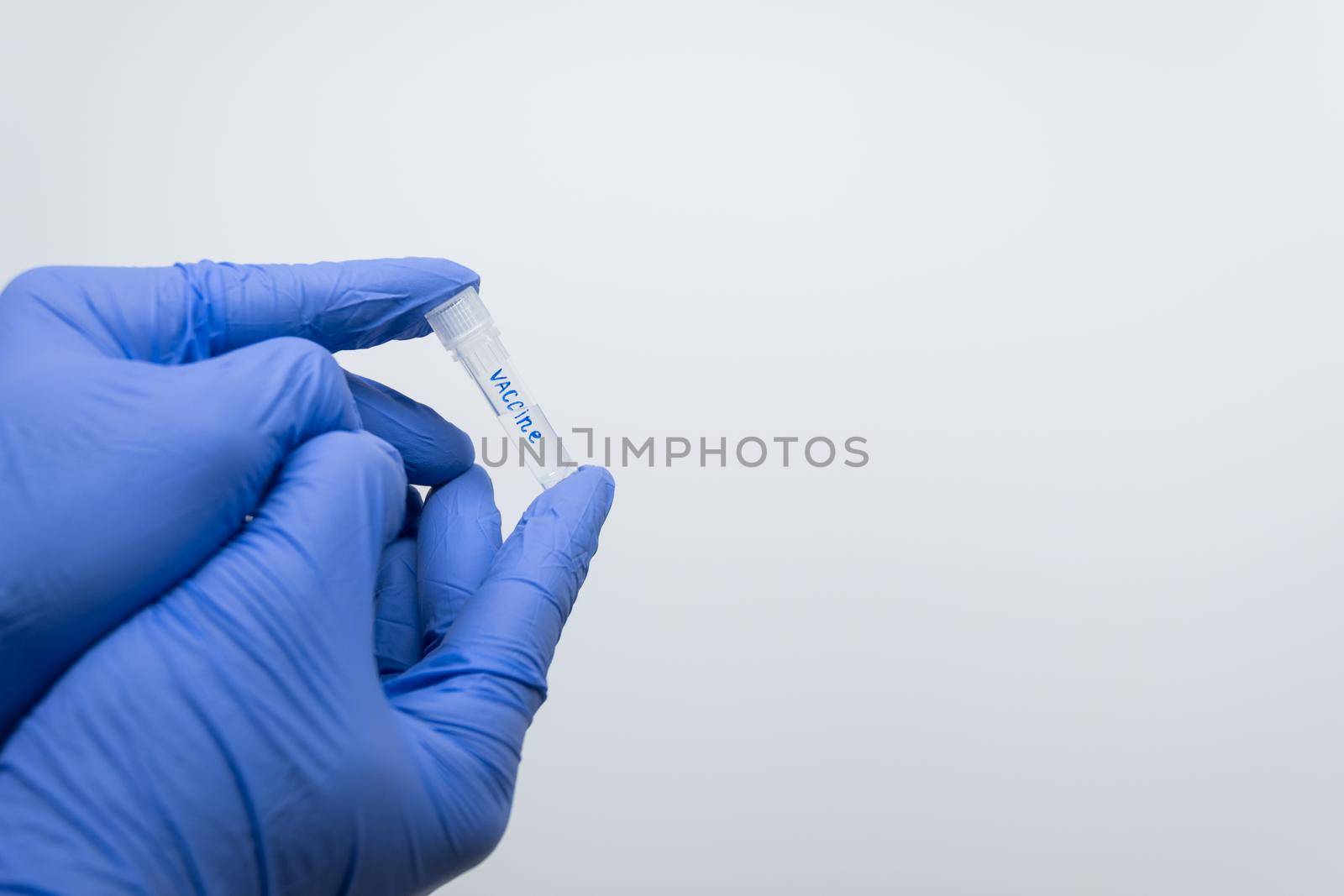 Vaccine in a small test tube. by Jannetta