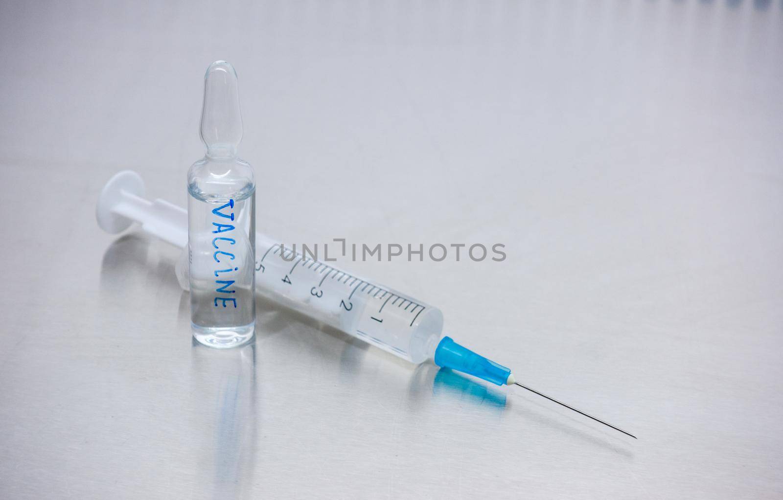 Vaccine in a sealed vial. by Jannetta
