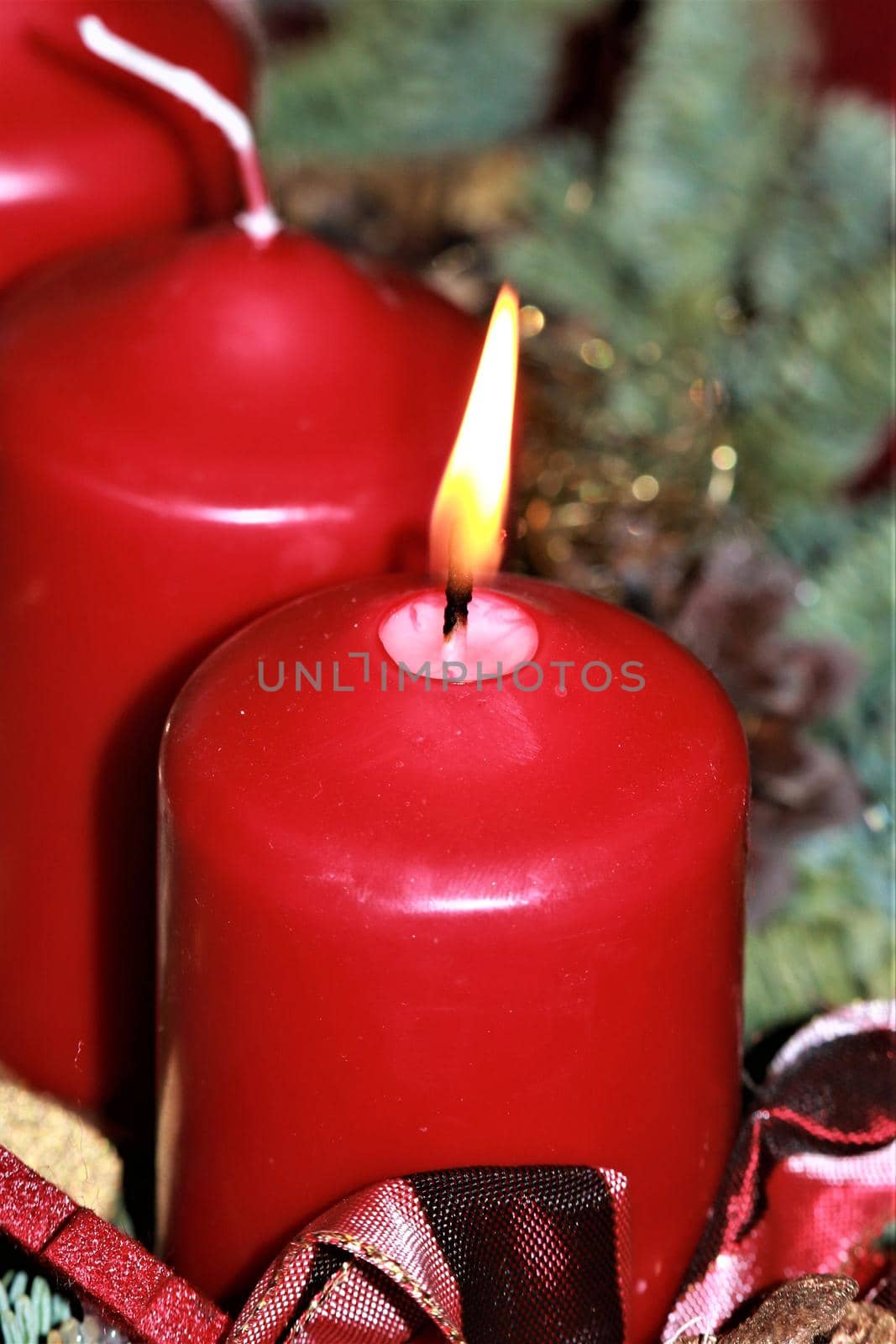 close up of an Advent arrangement with one burning candle by Luise123