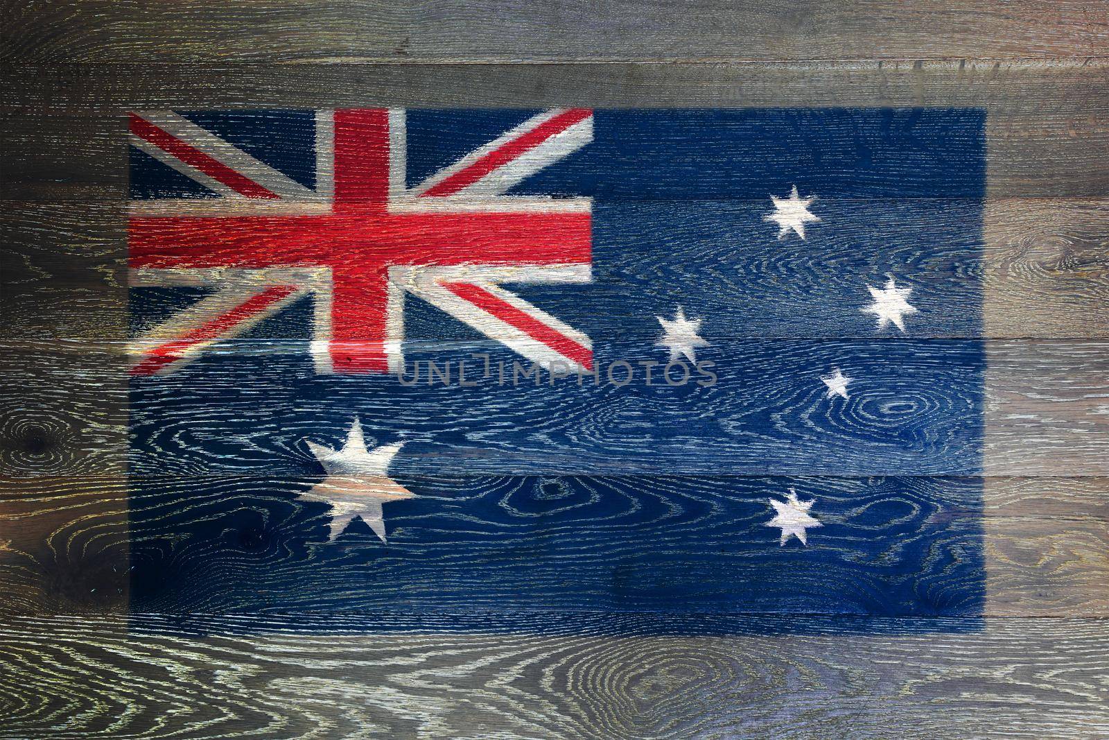 An Australia flag on rustic old wood surface background