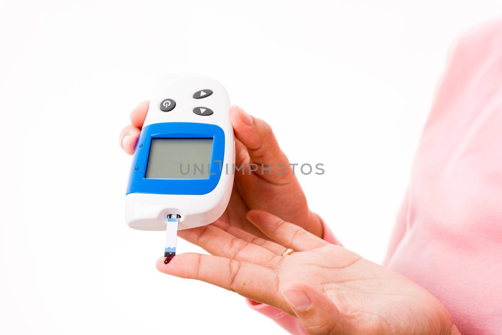 Closeup hands woman measur glucose test level check with blood on finger by glucometer she monitor and control high blood sugar diabetes and glycemic health care concept isolated on white background