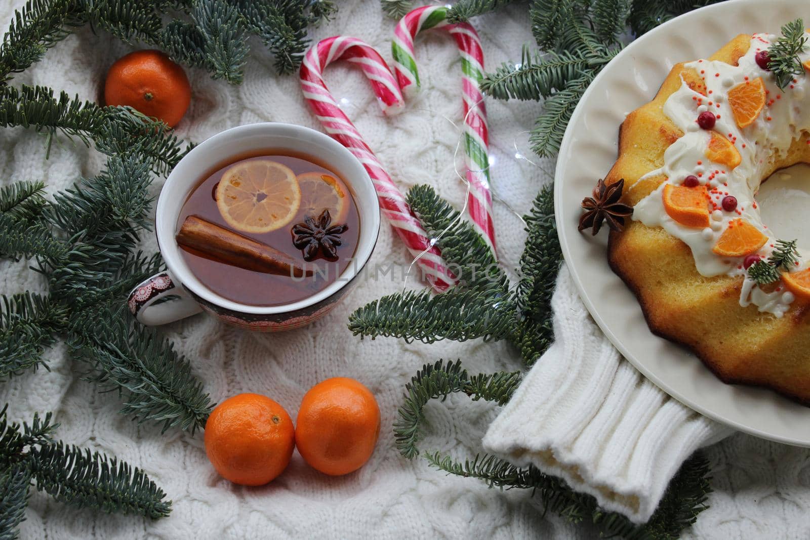Tea with cinnamon and tangerine pie.Texture or background
