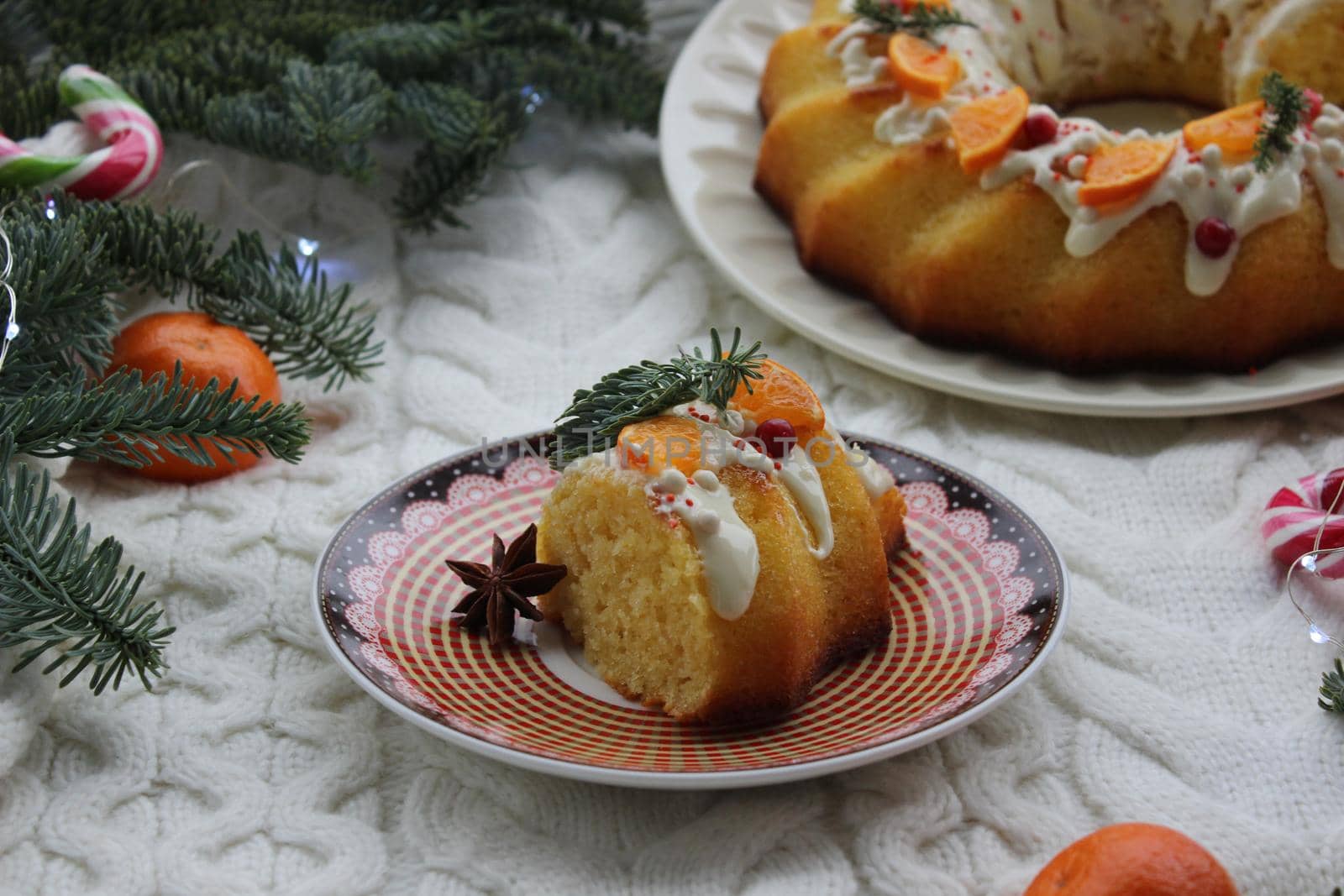 On the plate is a piece of new year's tangerine dessert.Texture or background