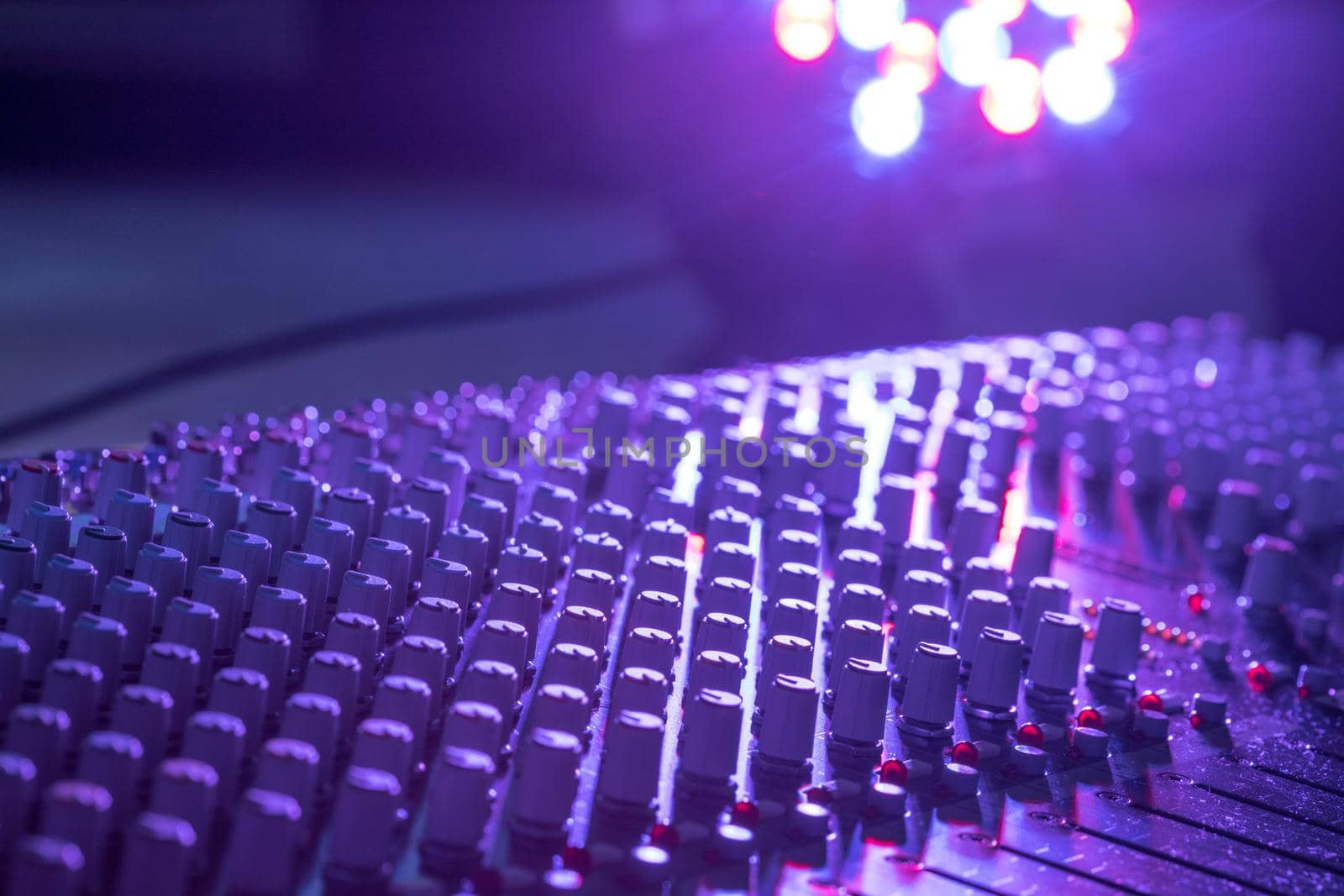 Sound recording studio mixer desk: professional music production by Daxenbichler