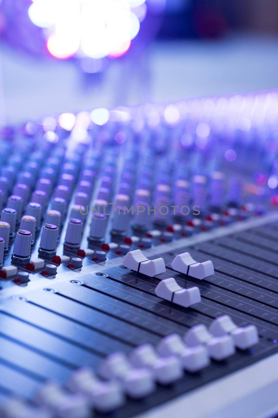 Sound recording studio mixer desk: professional music production by Daxenbichler