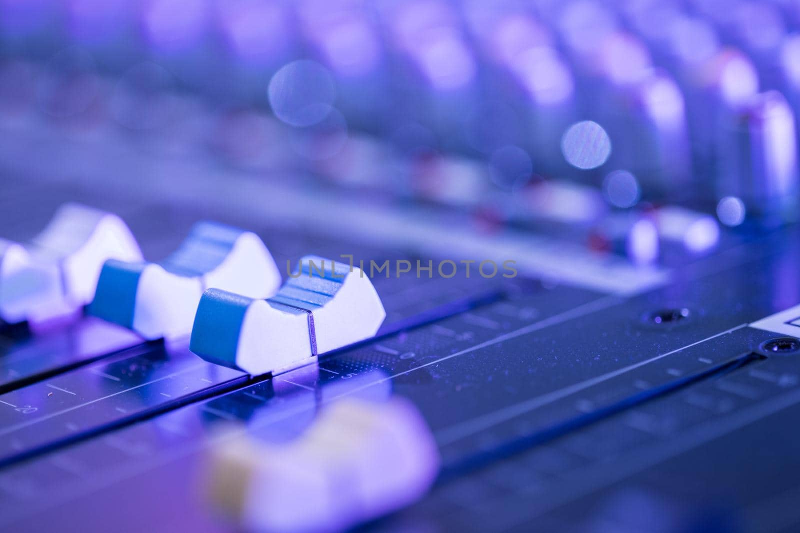 Sound recording studio mixer desk: professional music production by Daxenbichler