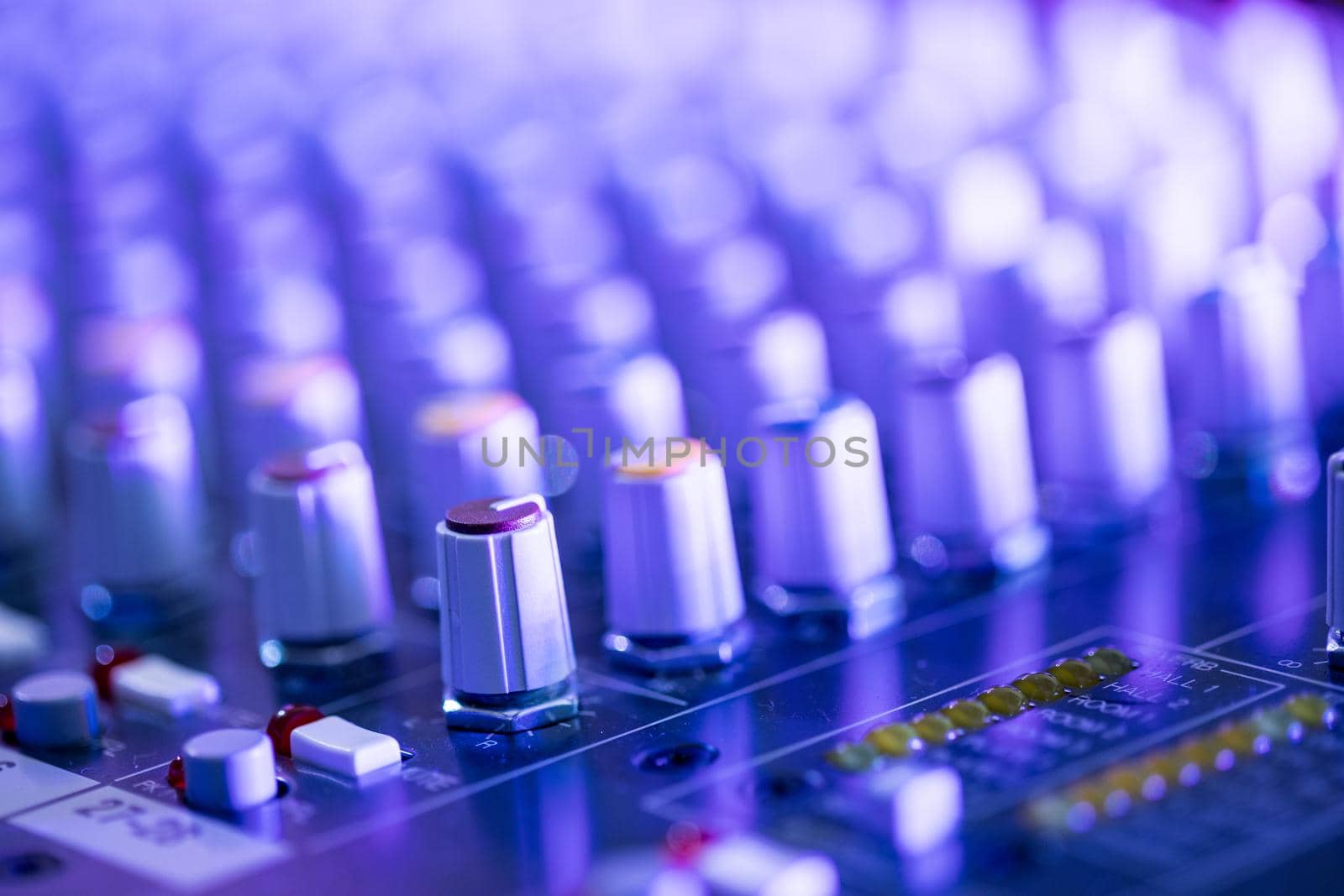 Professional music production in a sound recording studio, mixer desk