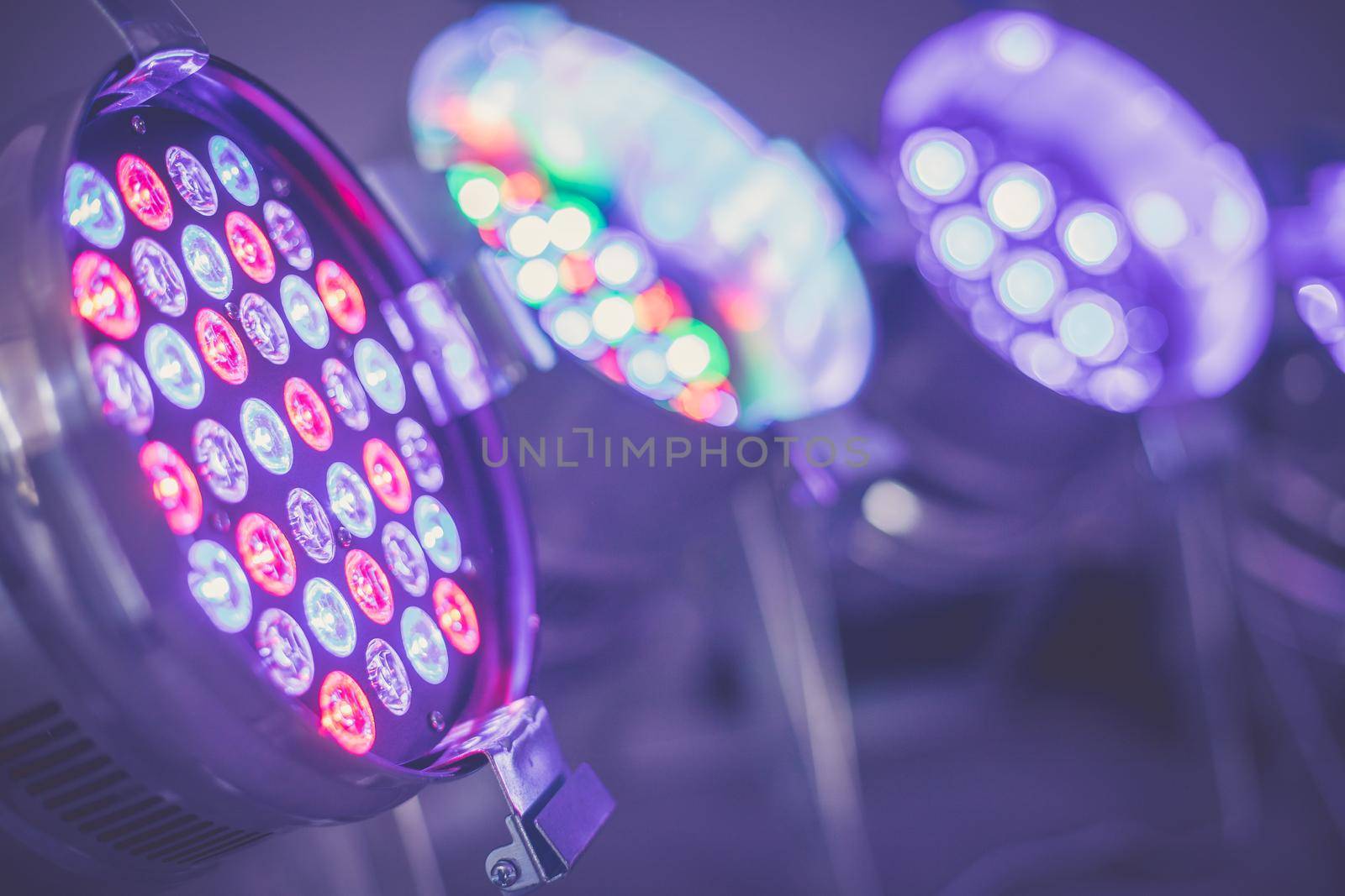 Party lighting: Colorful LED spots on the floor, hall
