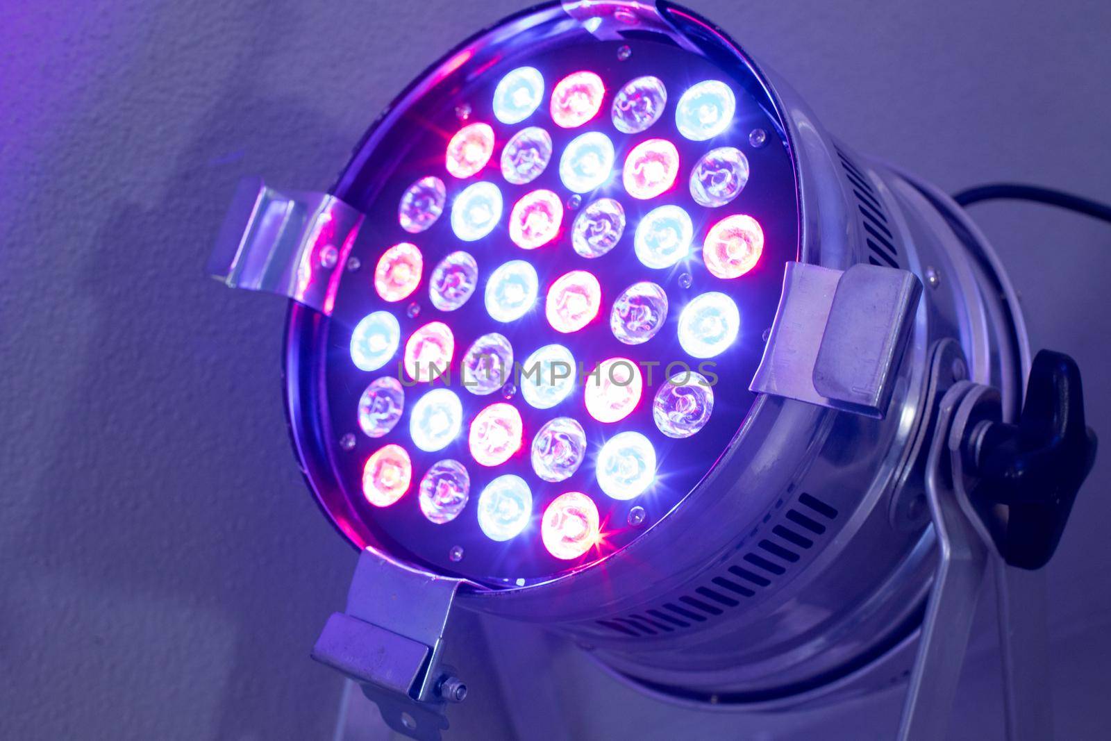 Party lighting: Colorful LED spots on the floor, hall