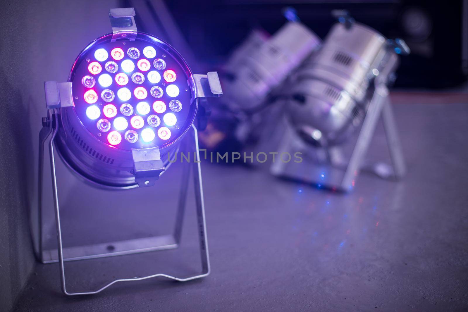 Party lighting: Colorful LED spots on the floor, hall