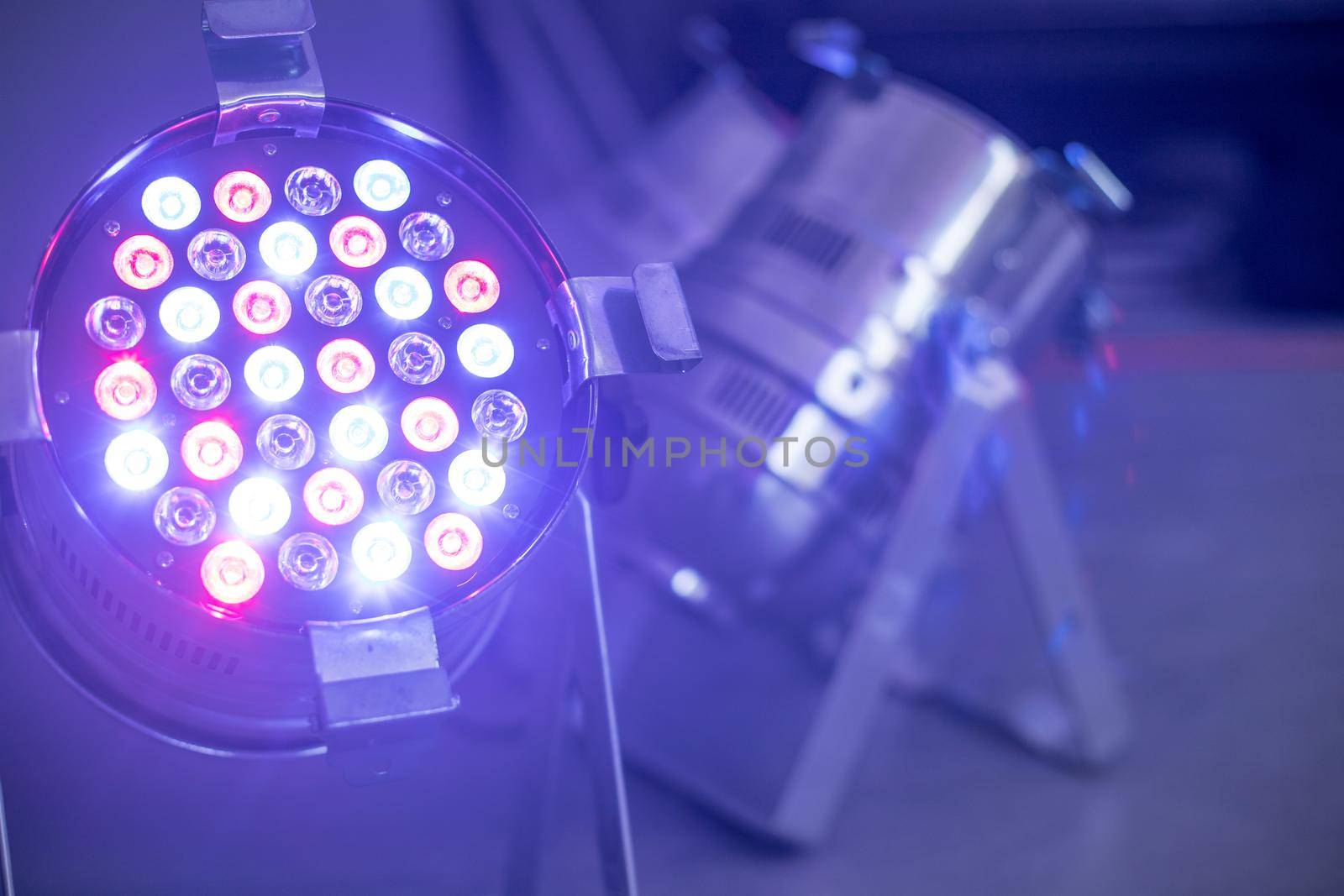 Party lighting: Colorful LED spots on the floor, hall