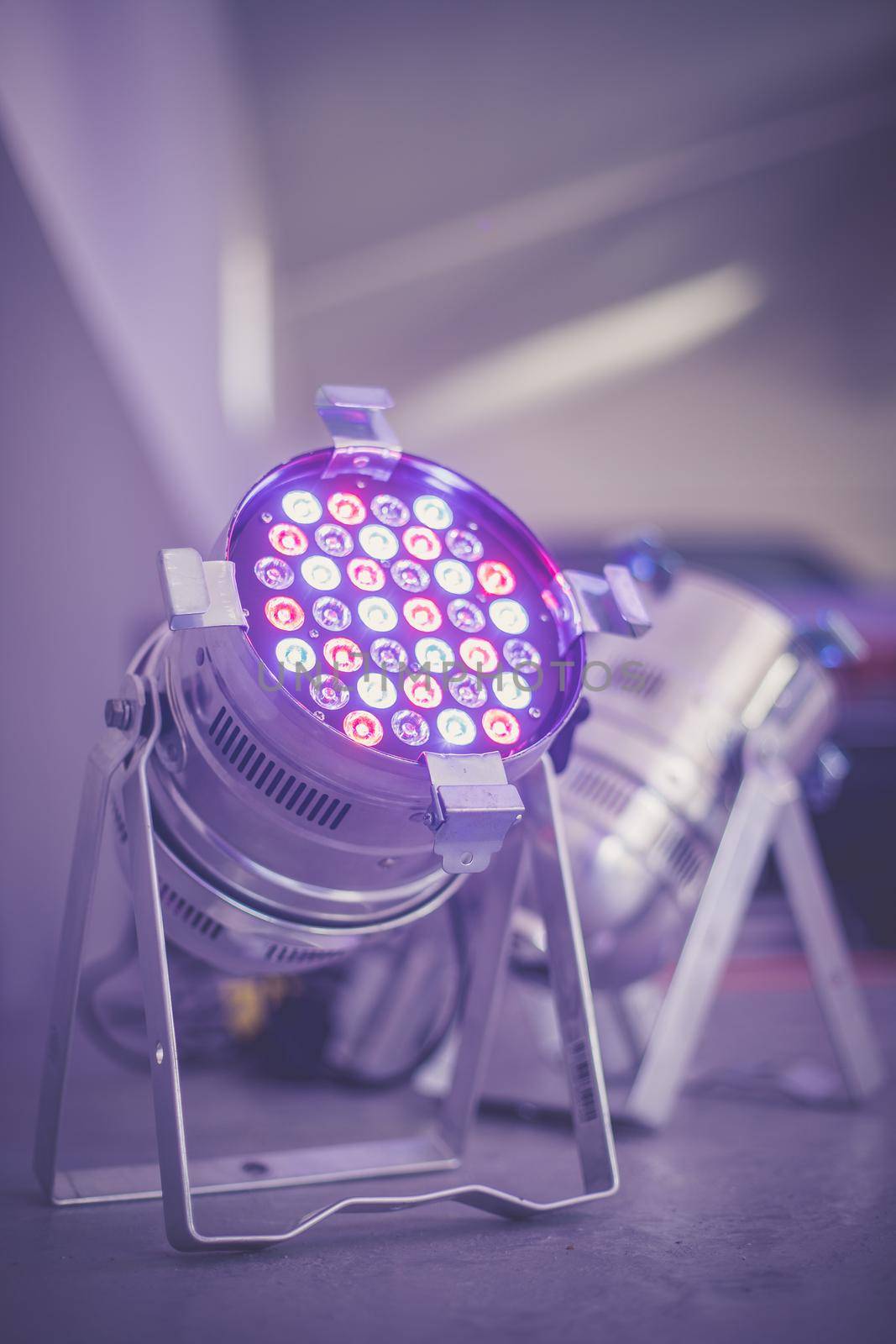 Party lighting: Colorful LED spots on the floor, hall