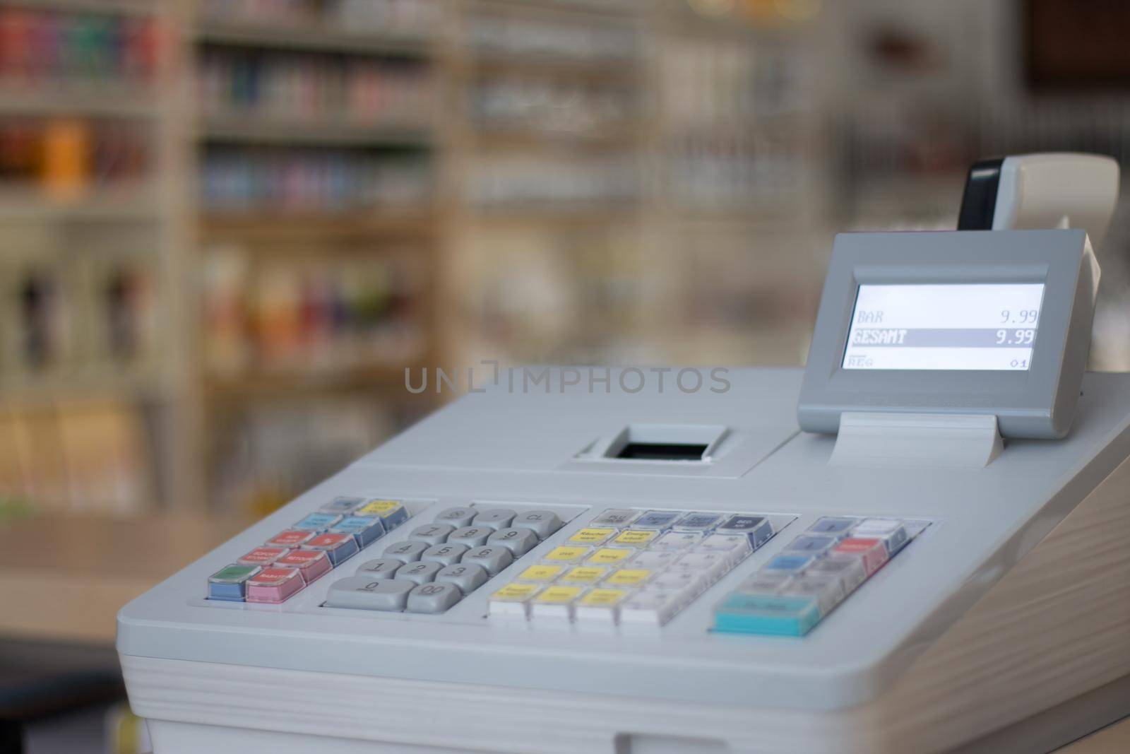 Cash register in a shop: Customer is paying purchase