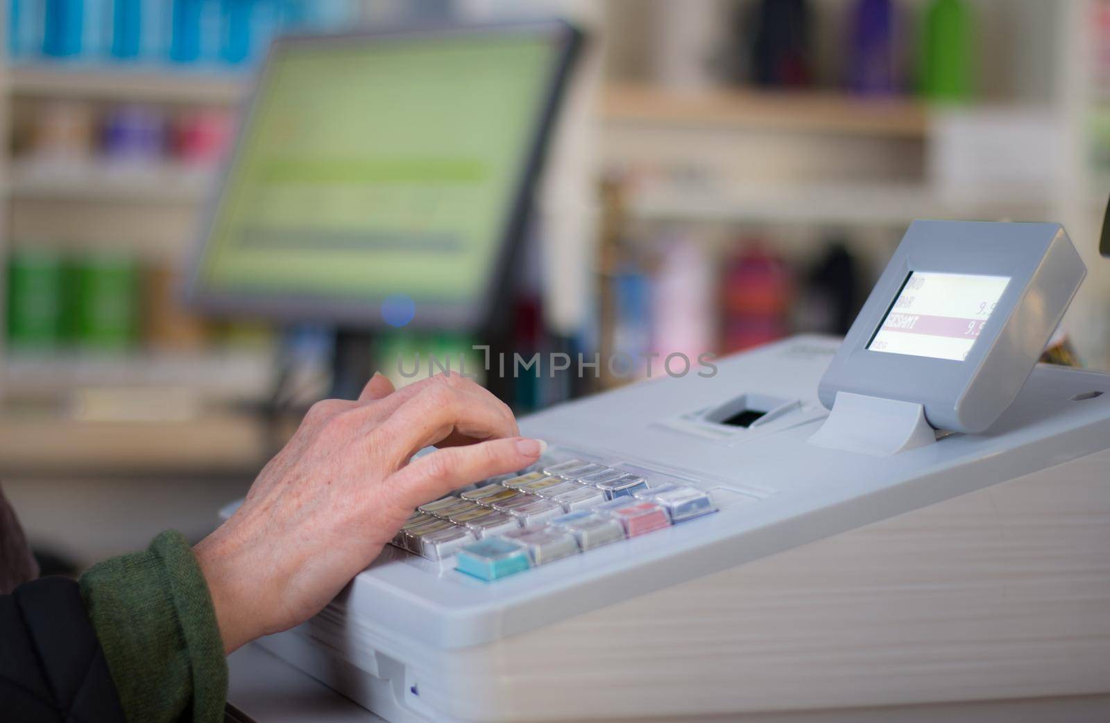 Cash register in a store by Daxenbichler