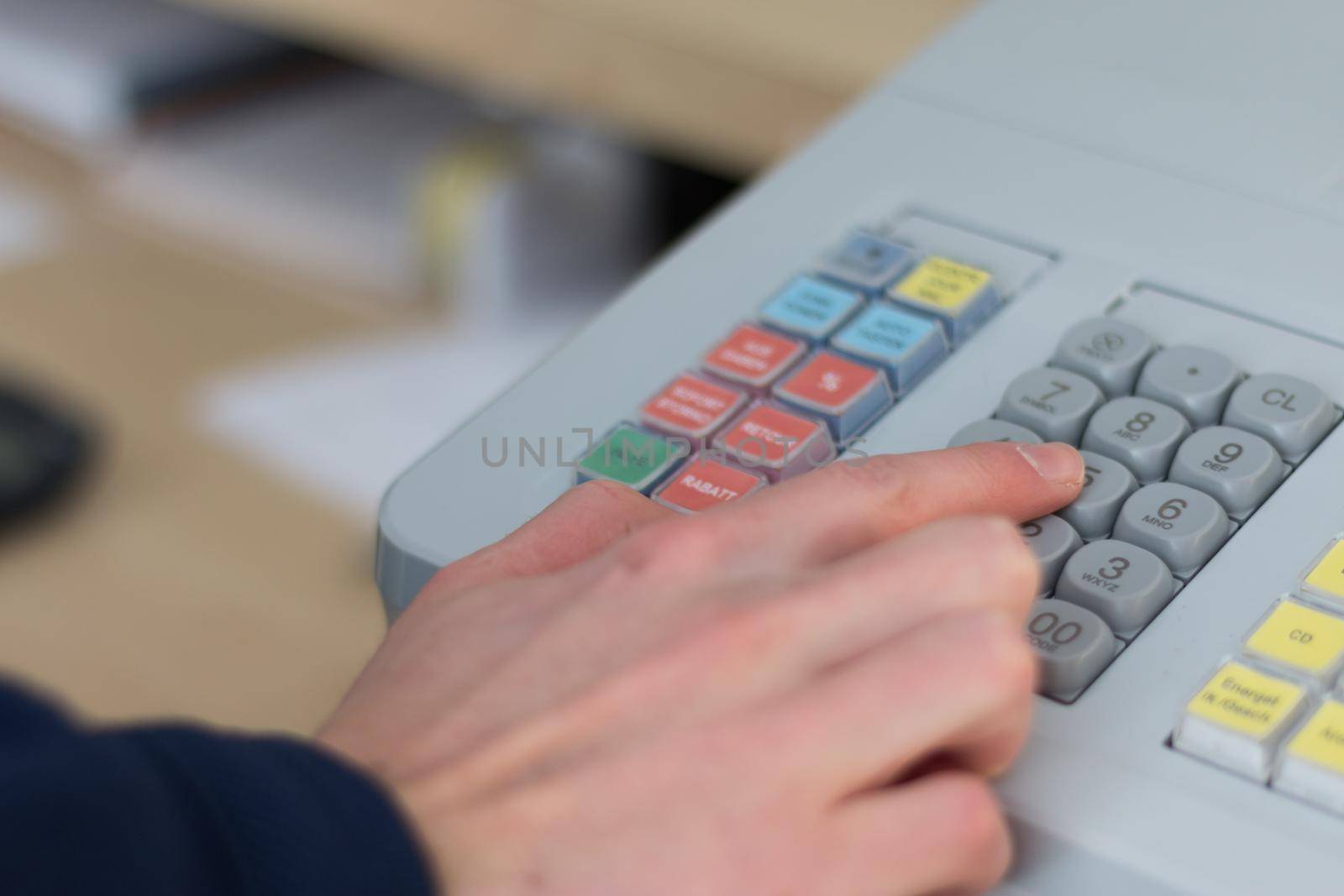 Cash register in a store by Daxenbichler