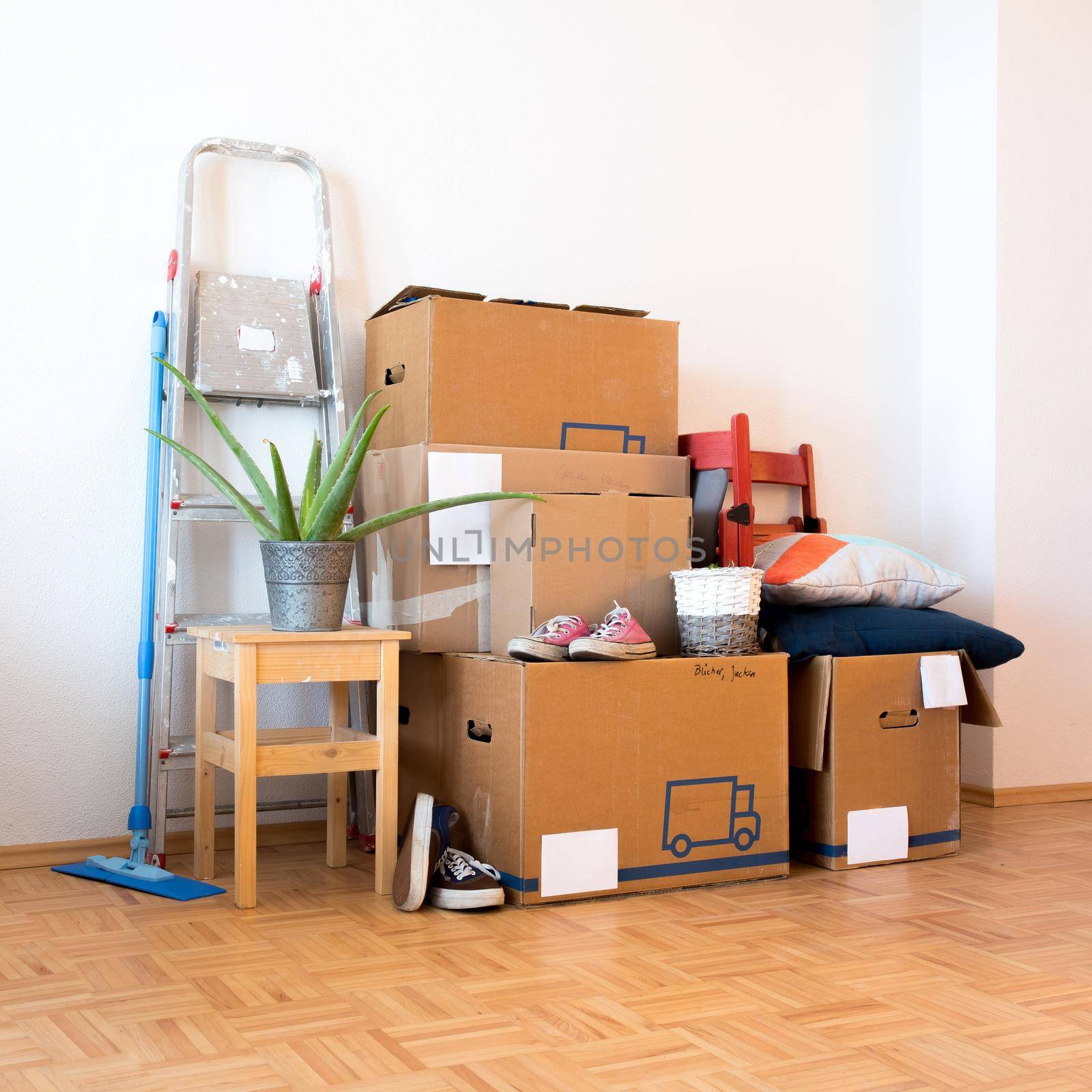 Move. Cardboard boxes, cleaning things and stuff for moving into a new, clean and bright home by Daxenbichler