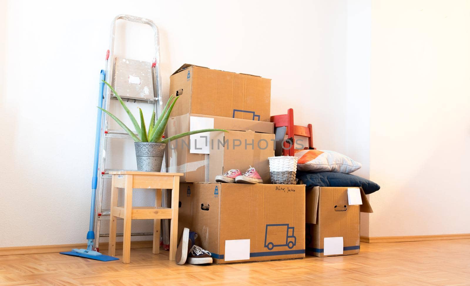 Move. Cardboard boxes, cleaning things and stuff for moving into a new, clean and bright home by Daxenbichler