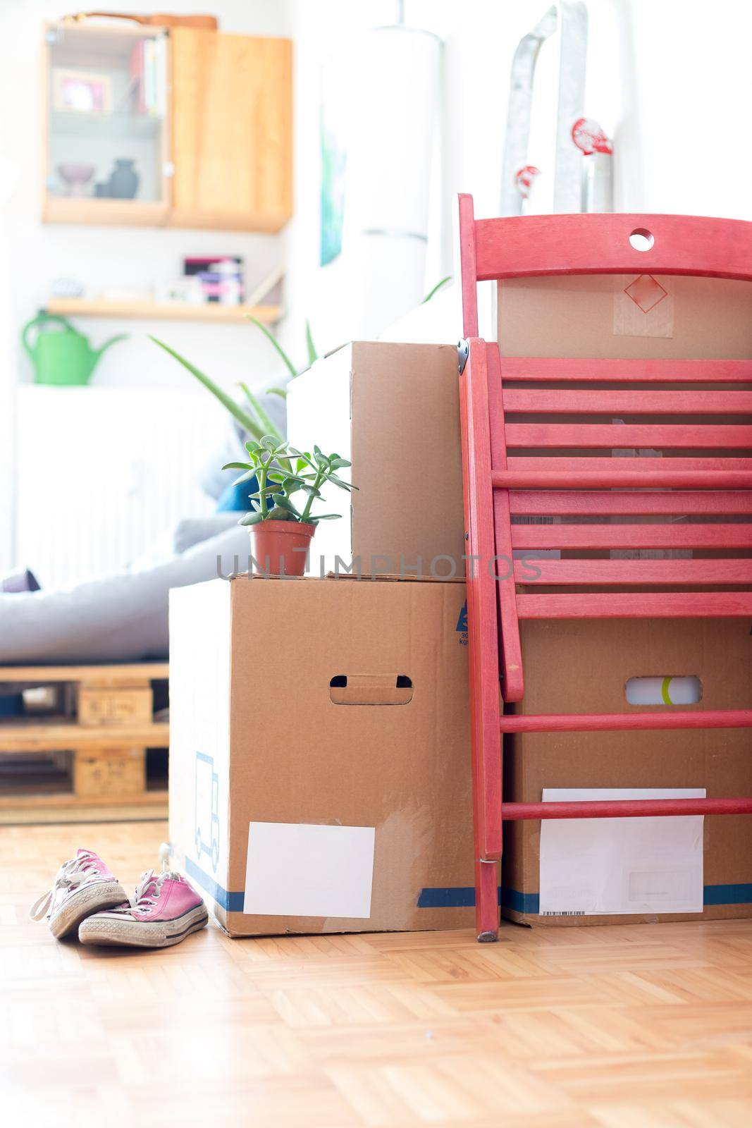 Move. Cardboard boxes, cleaning things and stuff for moving into a new, clean and bright home by Daxenbichler