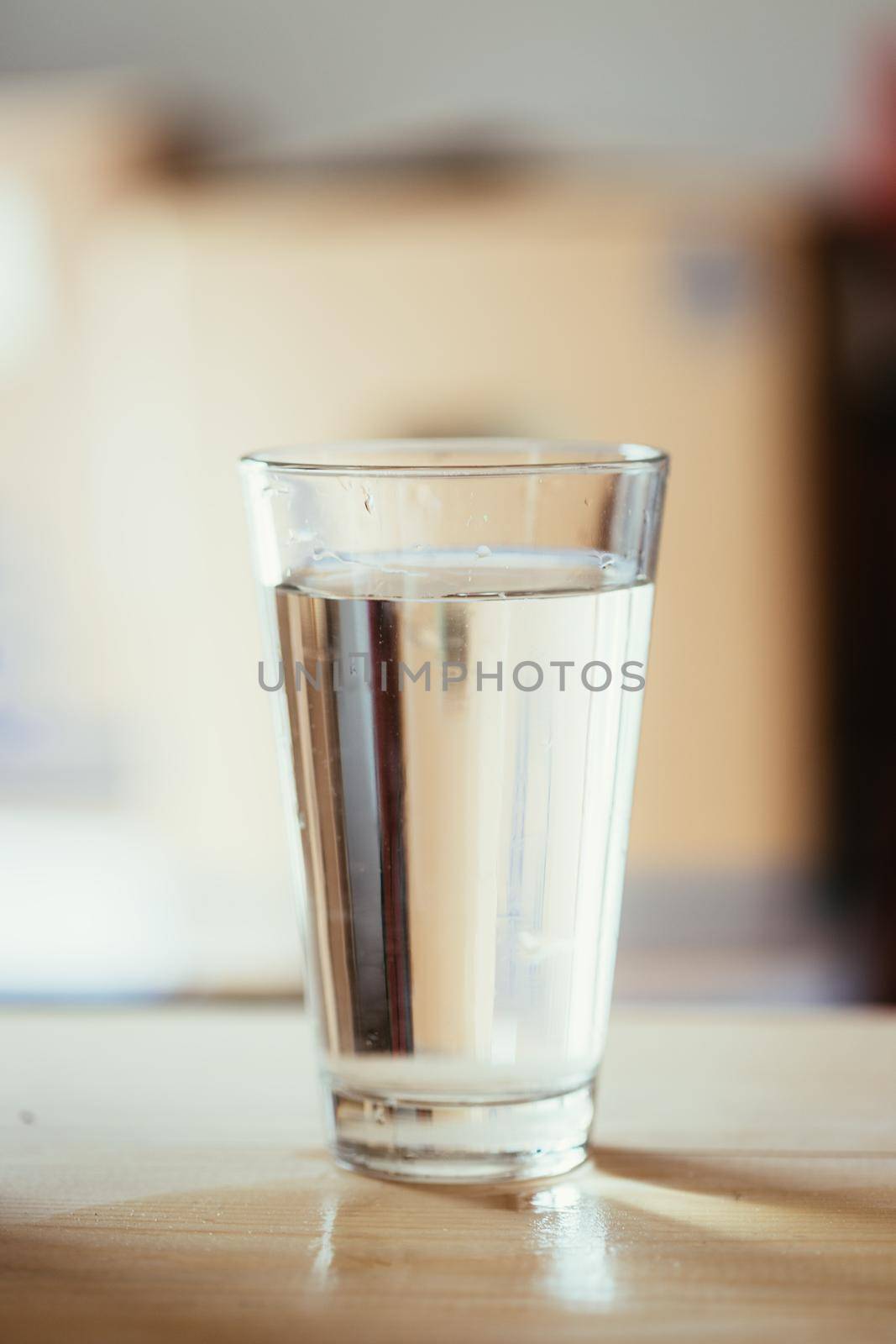 Clear glass of fresh, cold water