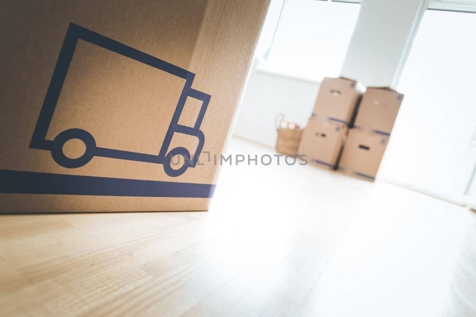 Move. Cardboard, boxes for moving into a new, clean and bright home by Daxenbichler