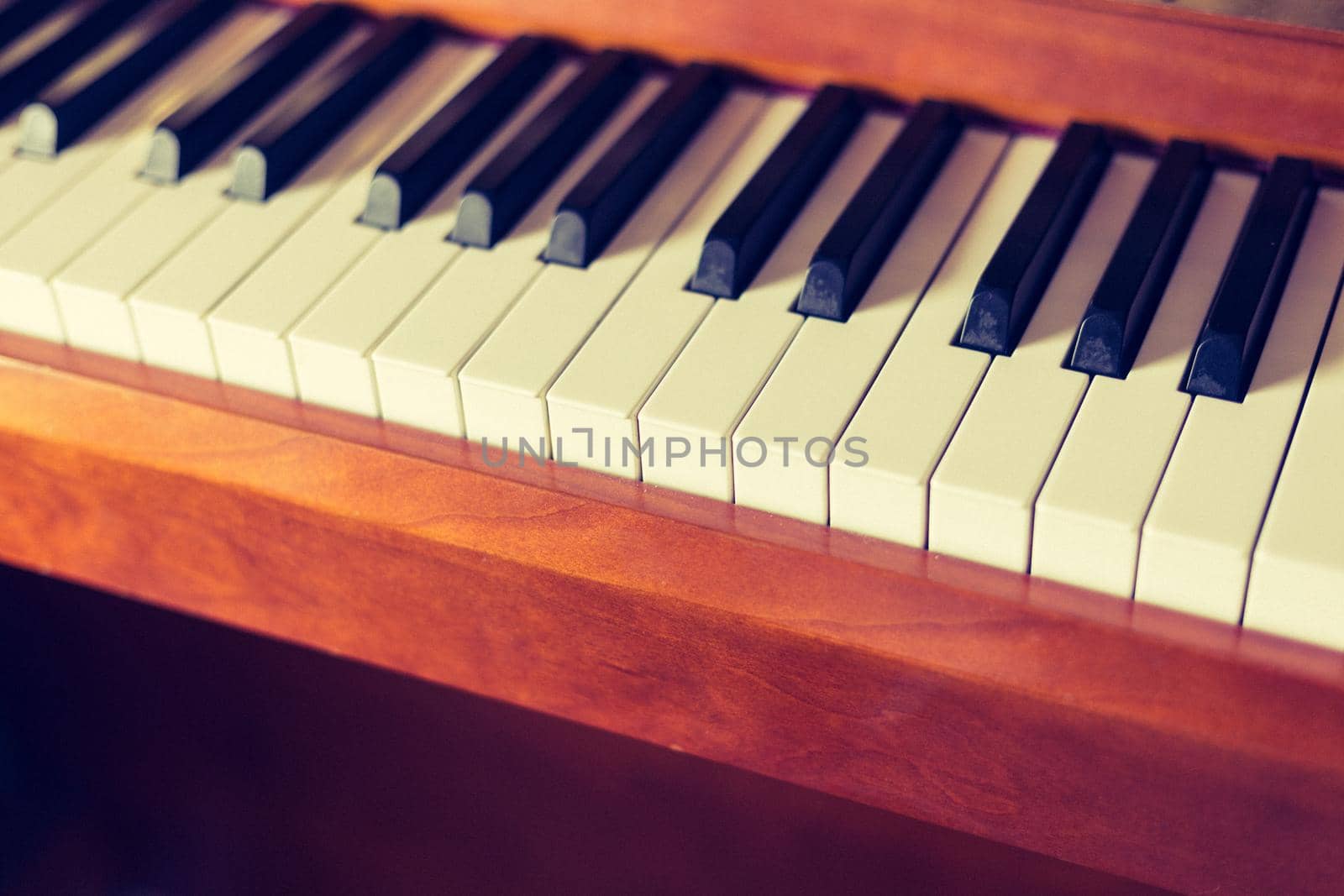 Rustic piano keys, close up picture. Classical instrument.