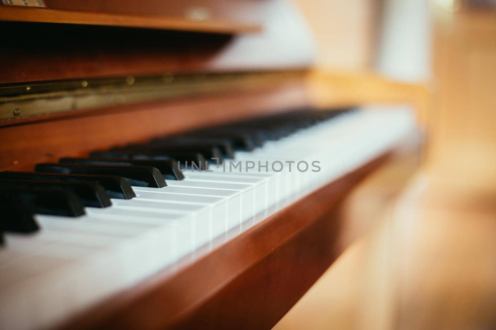 Rustic piano keys, close up picture. Classical instrument.