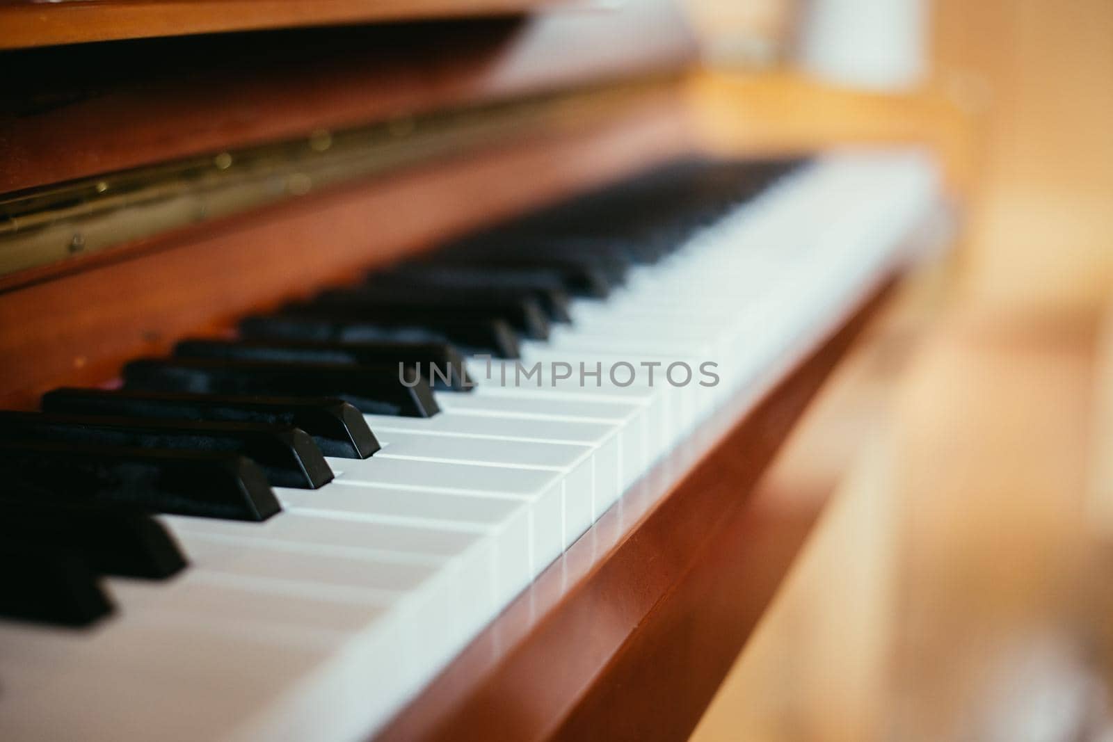 Rustic piano keys, close up picture. Classical instrument.