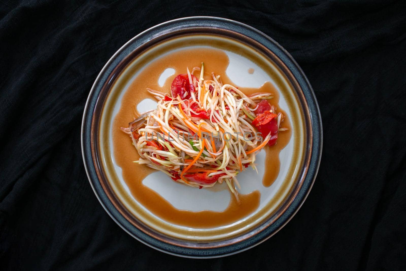 Papaya Salad menu, the main ingredient is papaya Is healthy food You can find it in street food stalls, a local dish in Thailand It is a popular food.