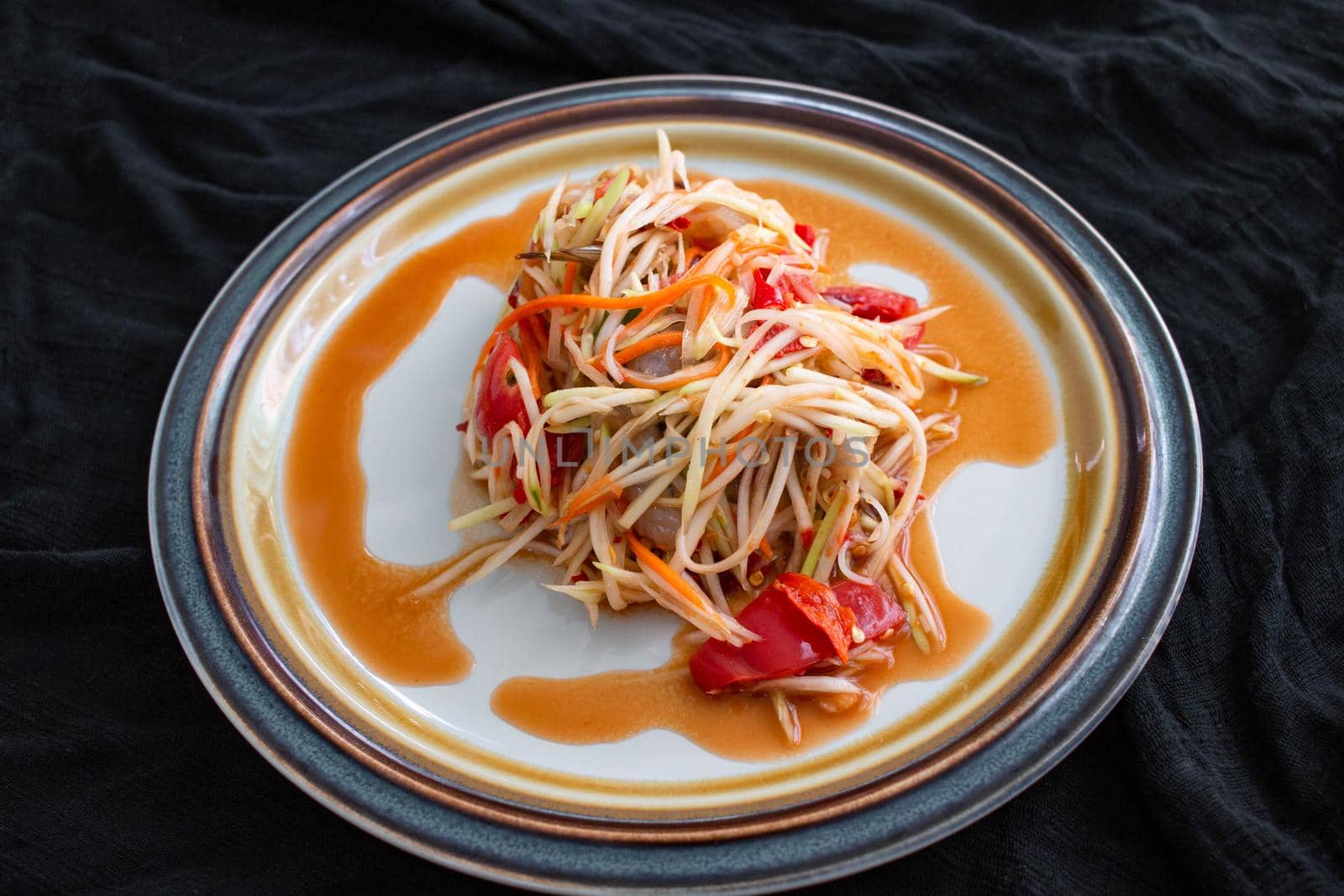 Papaya Salad menu, the main ingredient is papaya Is healthy food You can find it in street food stalls, a local dish in Thailand It is a popular food.