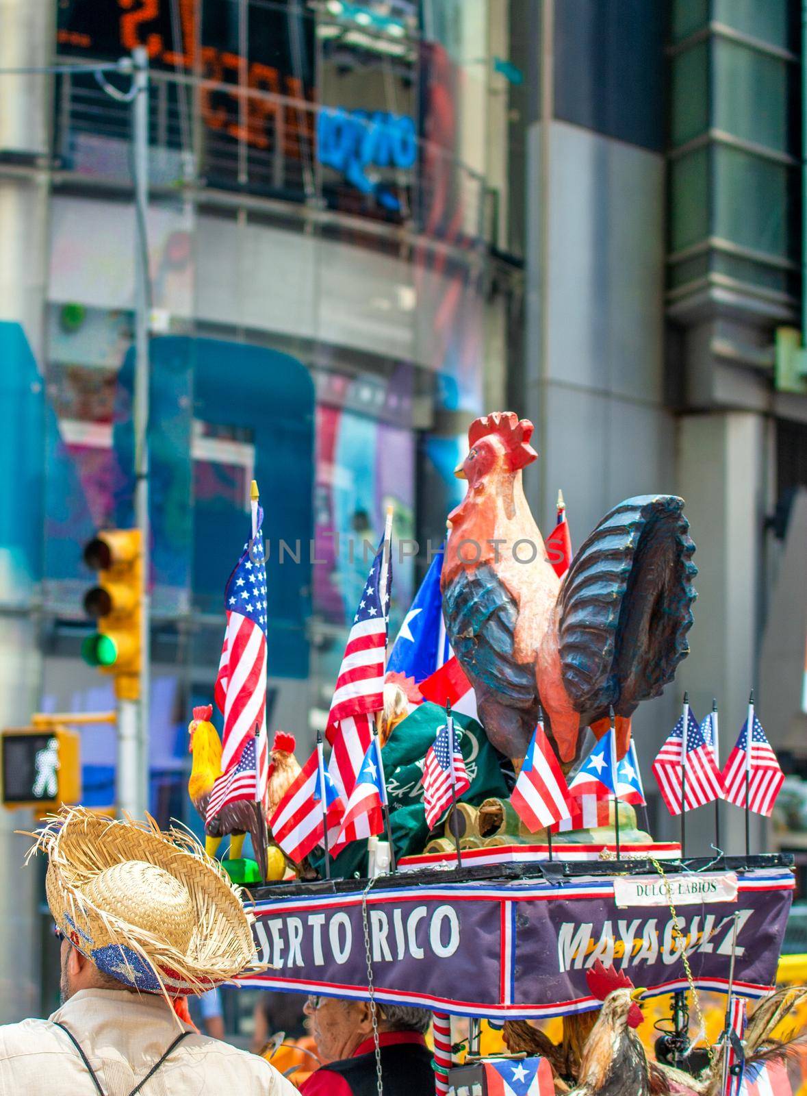 NEW YORK CITY - JUNE 11, 2013: Tourists in Times Square during a Puerto Rico festival.