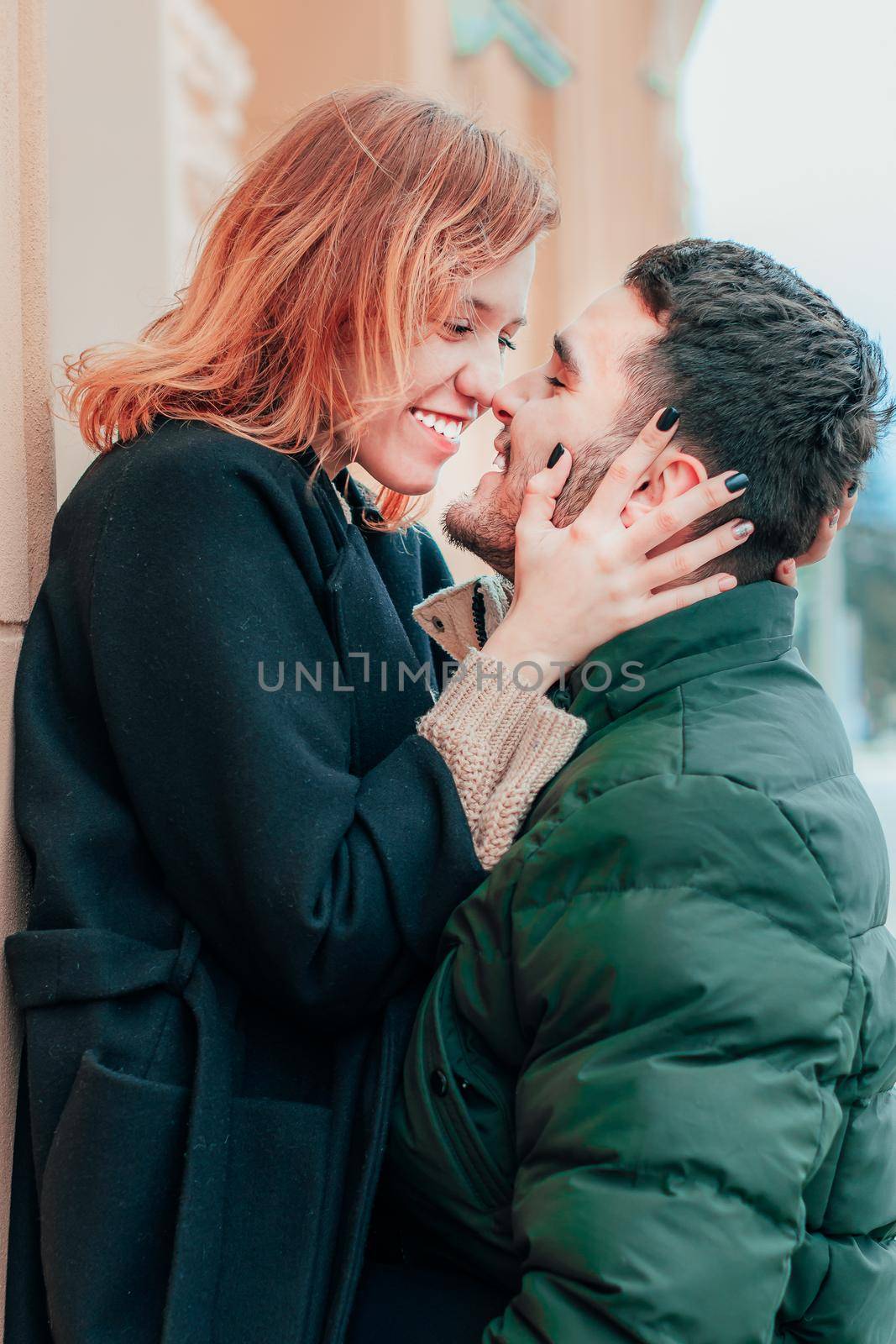 Happy Loving Couple Smiling and Hugging on the Street. Two Happy People Love Story - Medium CloseUp Portrait