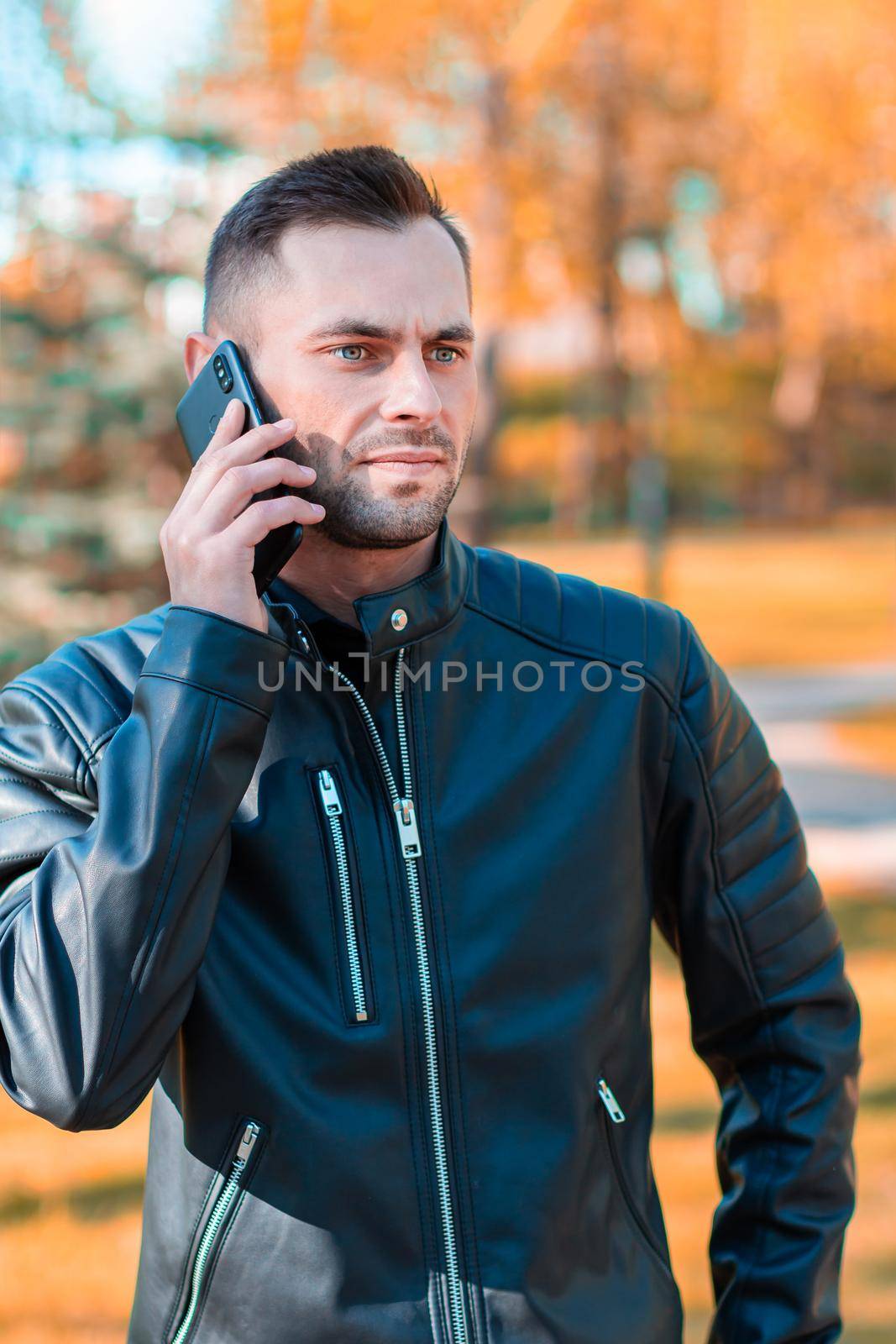 Young Man Using Smartphone for the Call by InfinitumProdux