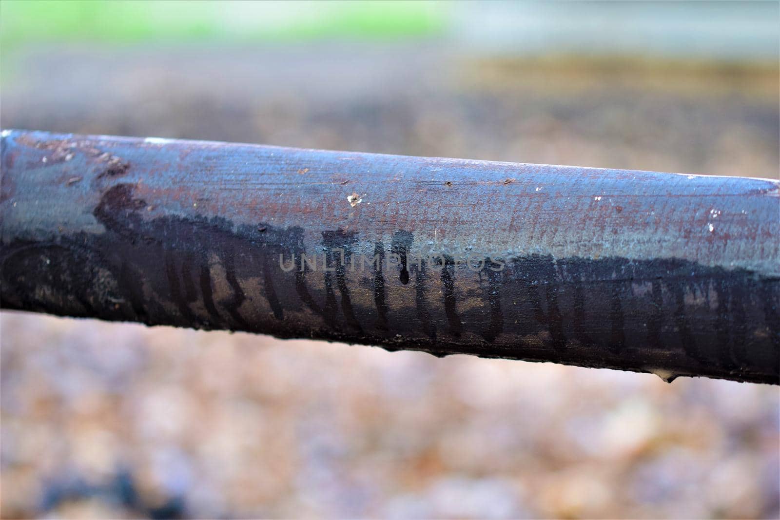 Close up of a pasture fence made of wooden slats