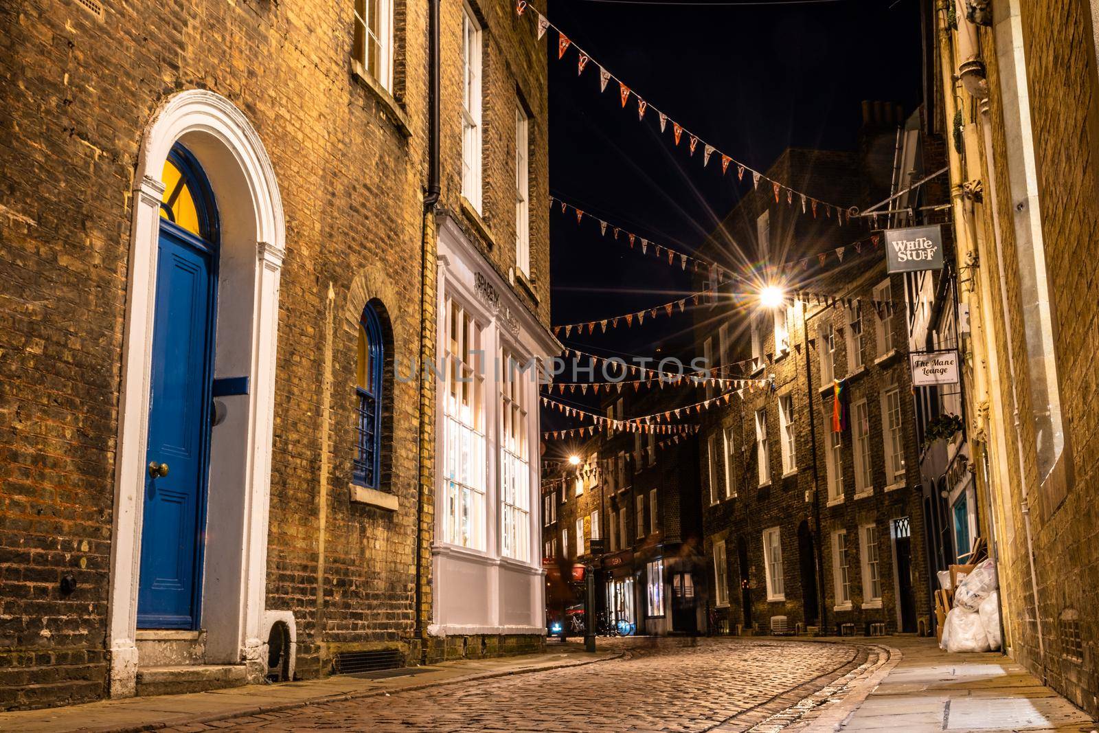 Low angle view of an empty and peaceful Green street at night