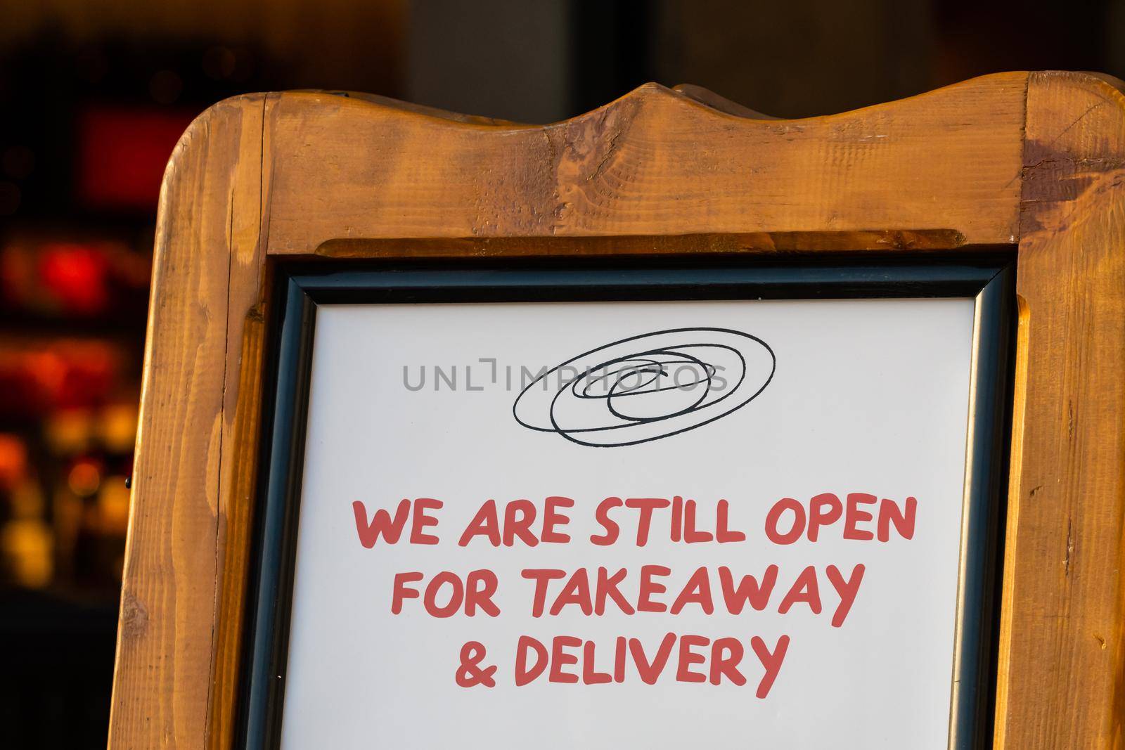 Open take away only sign outside a restaurant during lockdown caused by Covid-19 pandemic. Cambridge, UK