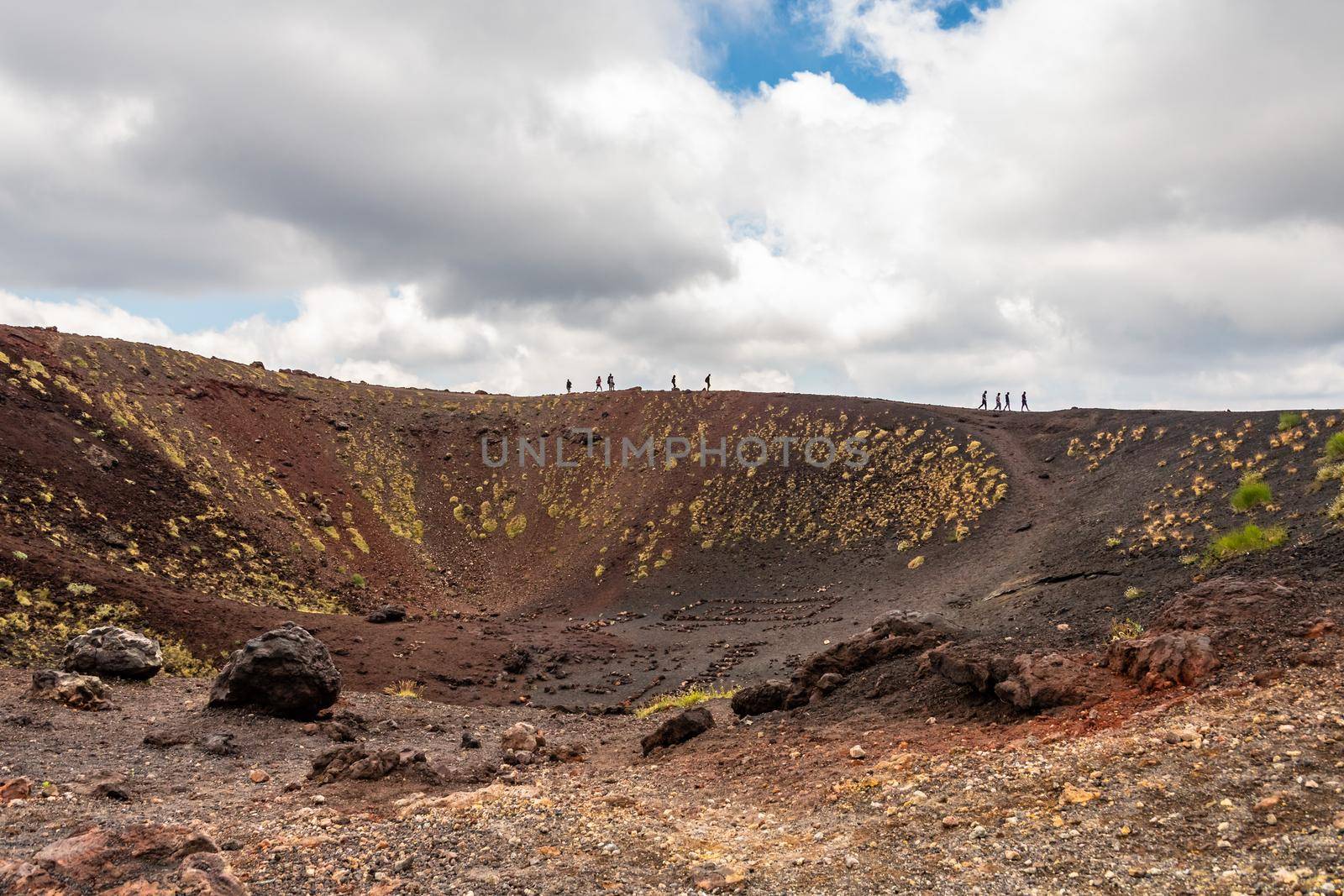 View of Etna volcano craters among the clouds near Rifugio Sapienza. Sicily, Italy