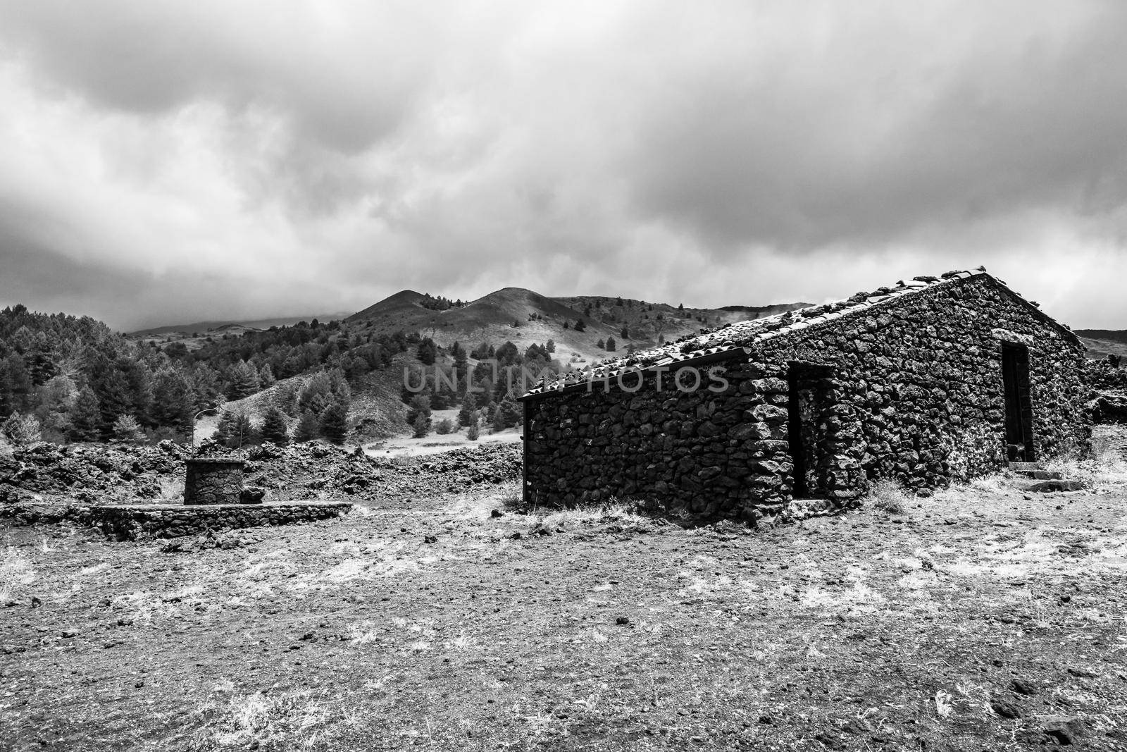 Santa Barbara refuge on Mount Etna and the lava stone well, Sicily by mauricallari