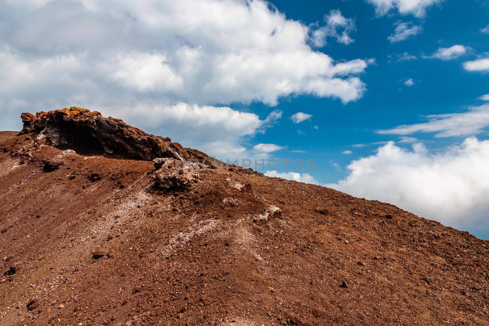 View of Etna volcano craters among the clouds near Rifugio Sapienza. Sicily, Italy