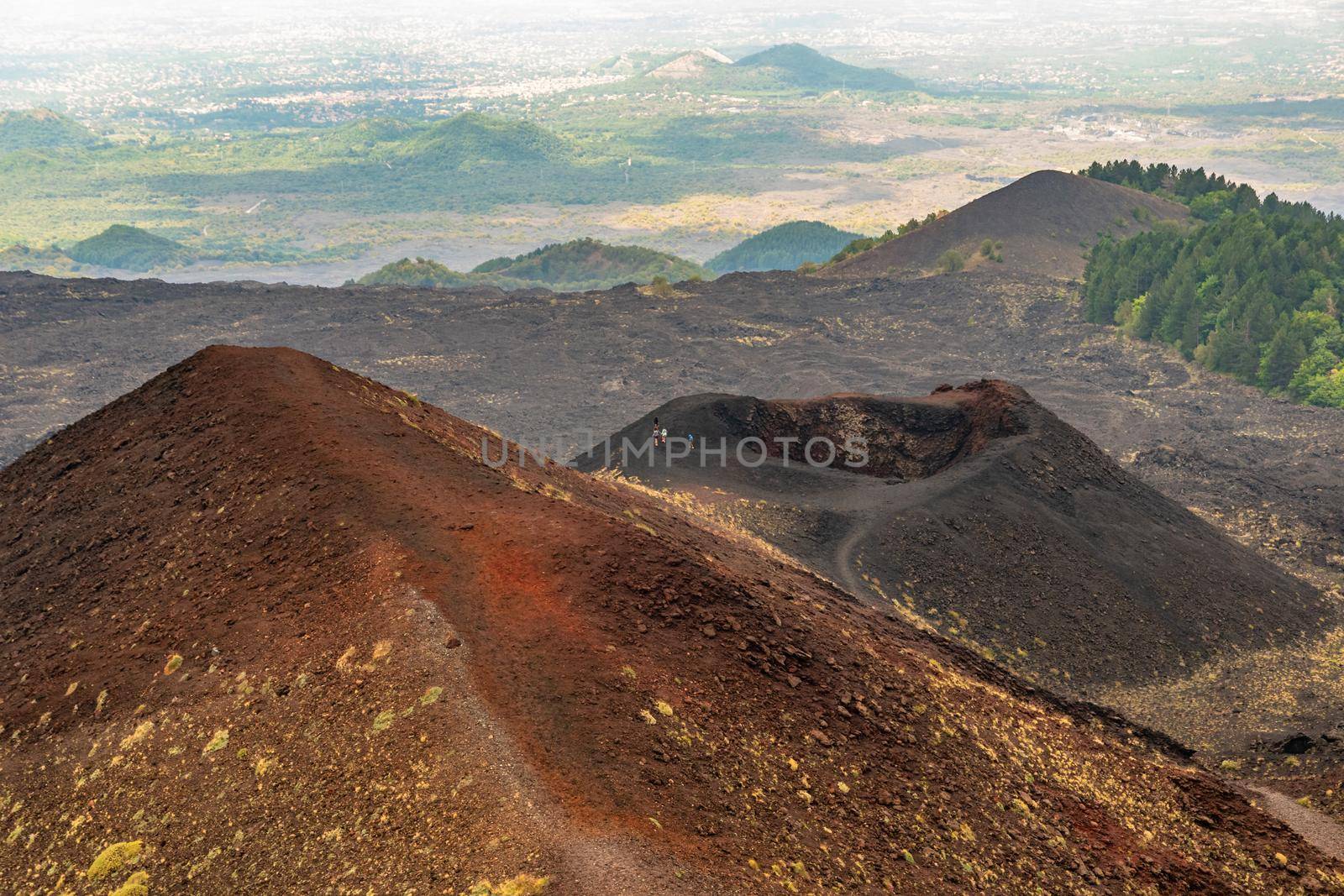 View of Etna volcano craters among the clouds near Rifugio Sapienza. Sicily, Italy