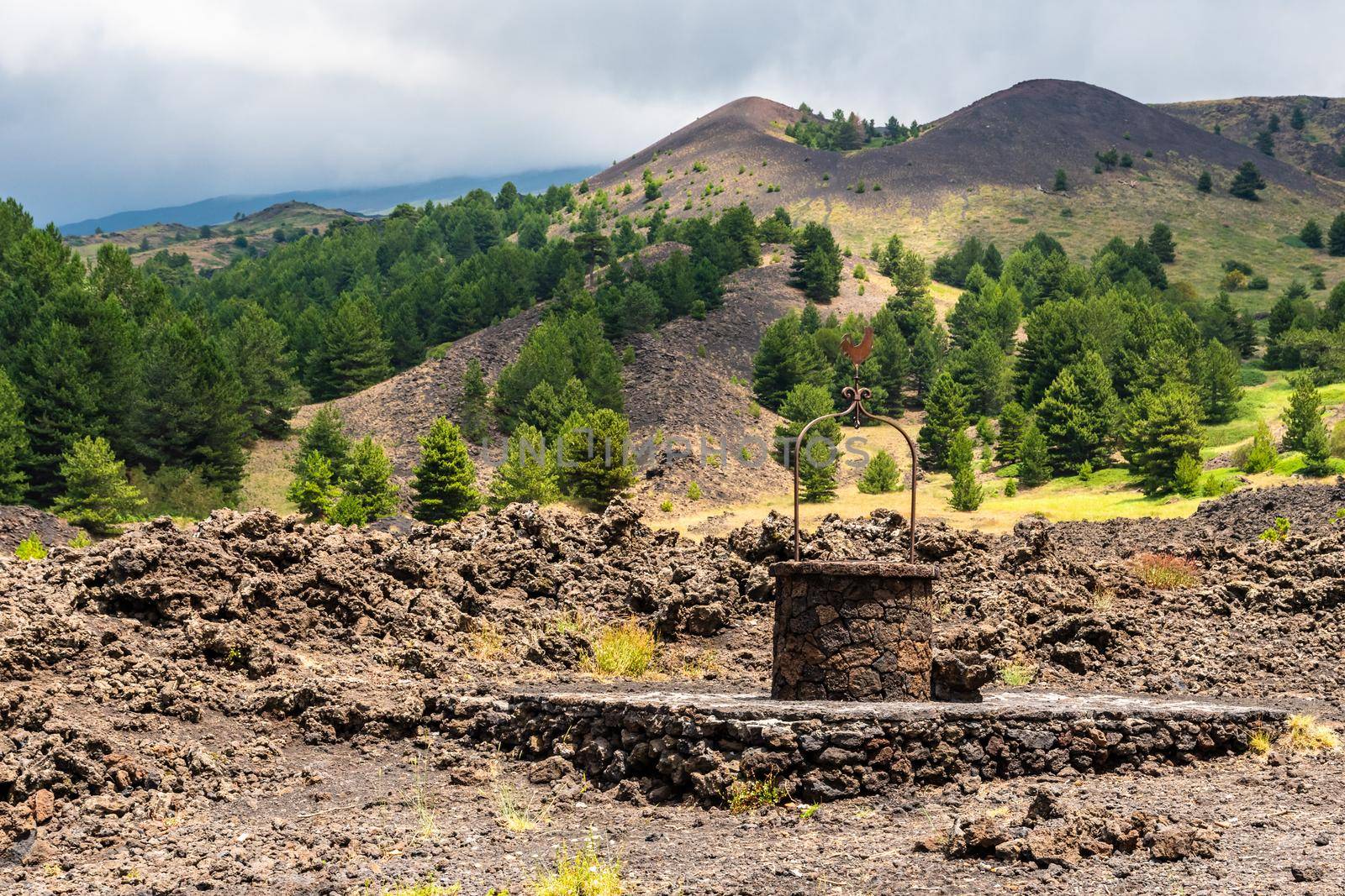 Santa Barbara refuge on Mount Etna built with lava stones, including the water well