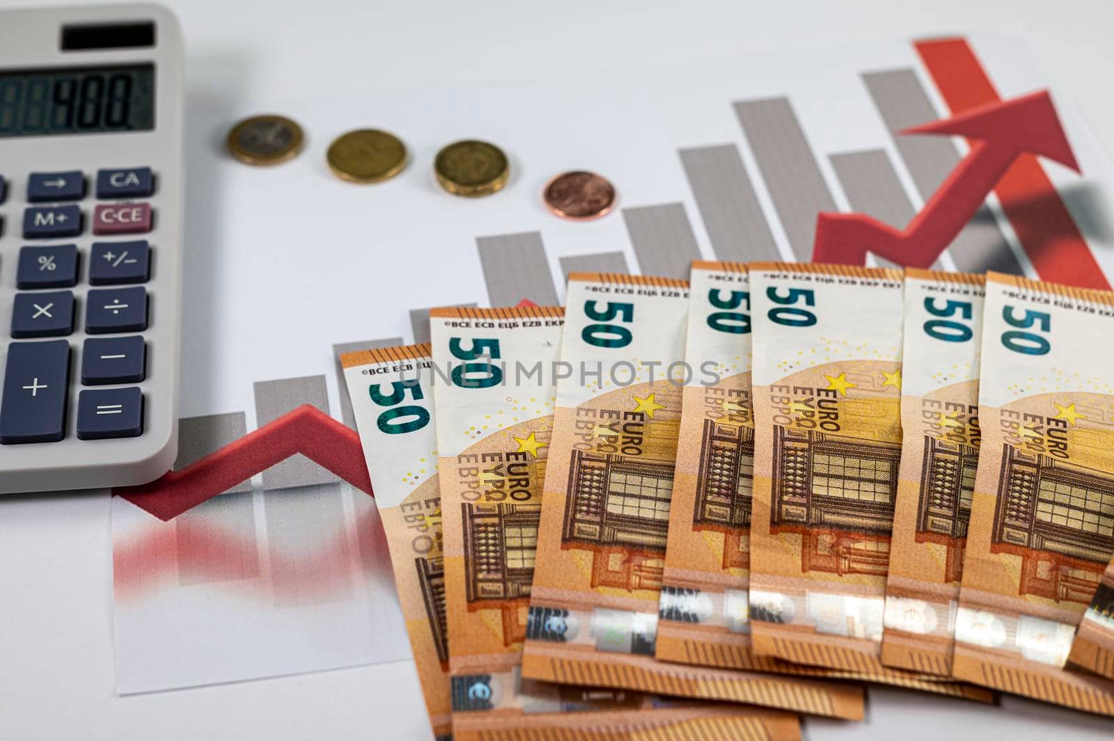 50 euro banknotes coins and statistics on white background