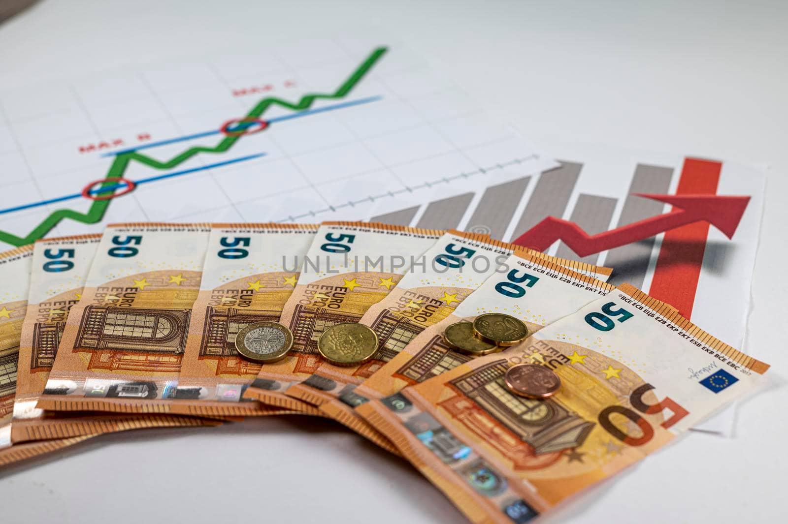 50 euro banknotes coins and statistics on white background