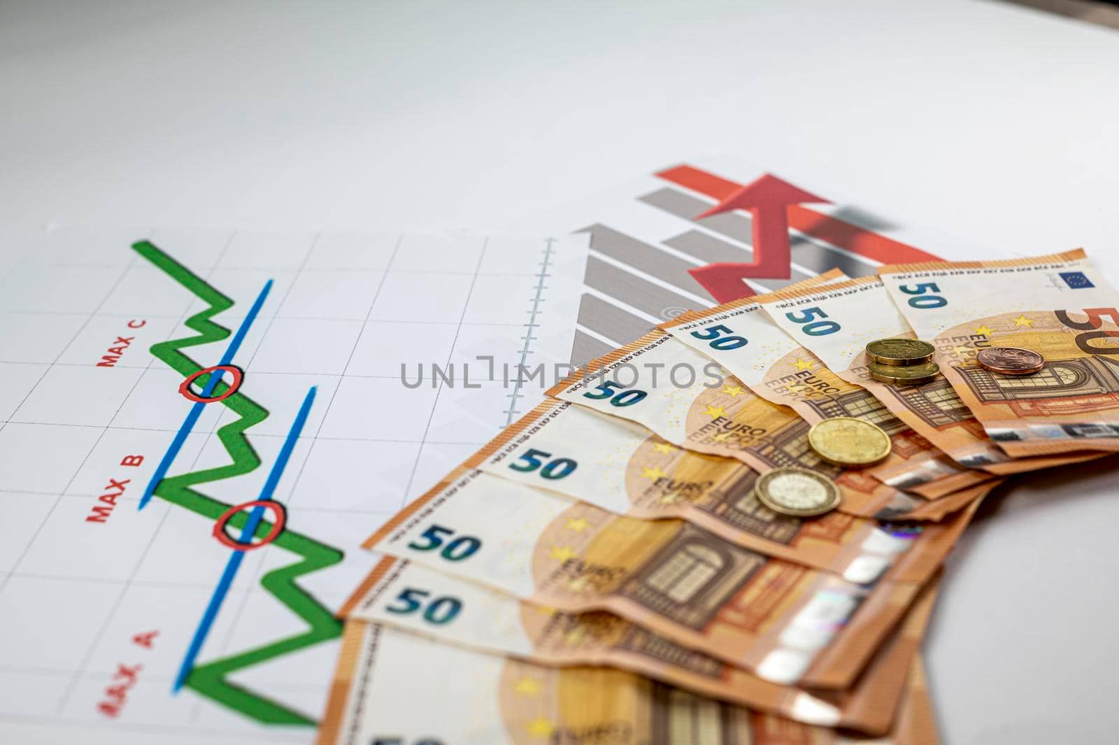 50 euro banknotes coins and statistics on white background