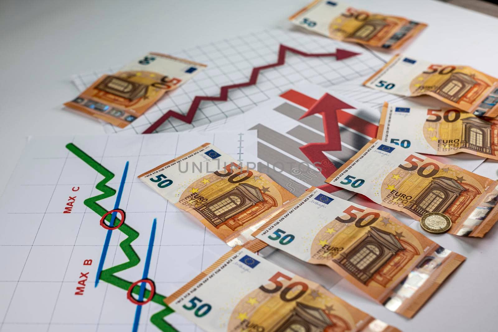 50 euro banknotes coins and statistics on white background