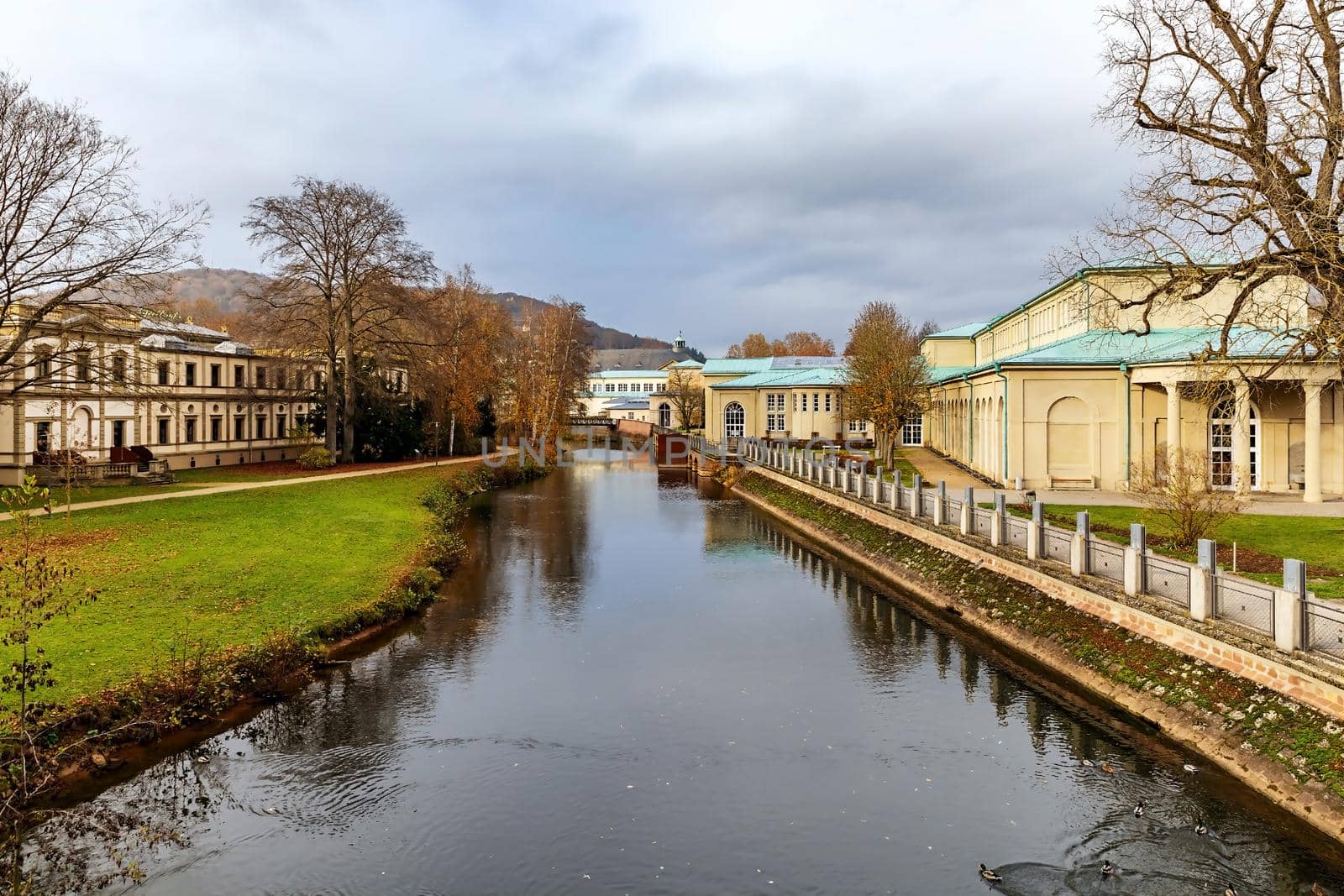 A promenade along a river channel in Bad Kiesseng, Germany. by seka33