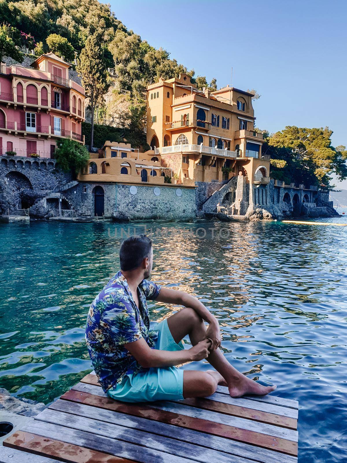 Portofino Liguria Italy, Beautiful bay with colorful houses in Portofino, Liguria, Italy.Europe, young men on vacation Italy Portofino