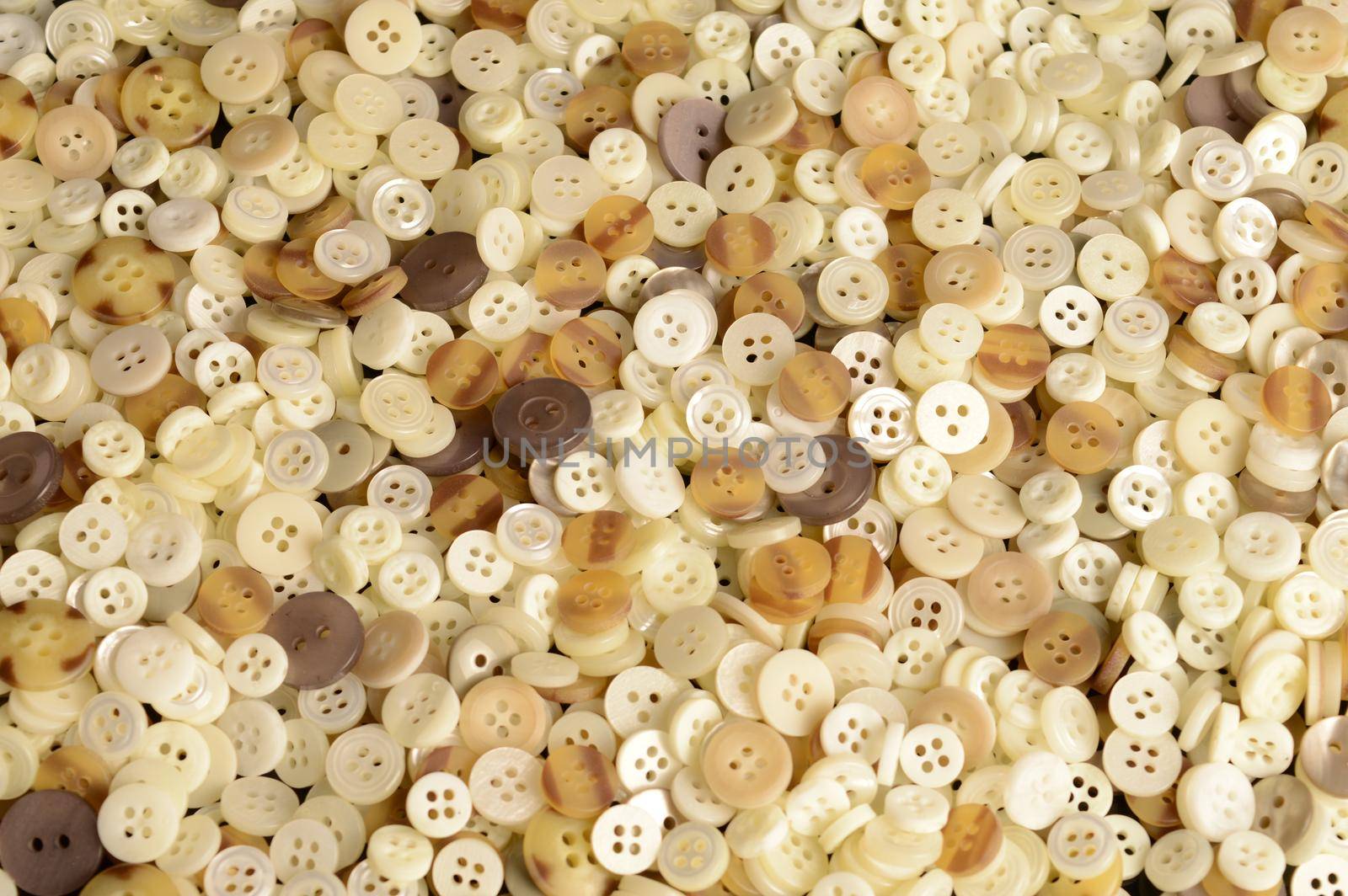A macro shot of many buttons to create a full frame background image.