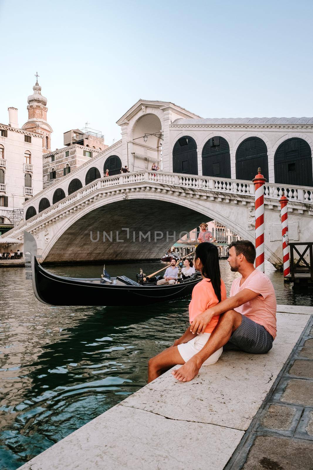 Italy Venice, almost empty city of Venice during summer 2020 with the covid 19 pandemic surge in Italy. Europe Venzia, couple on city trip in Venice Italy