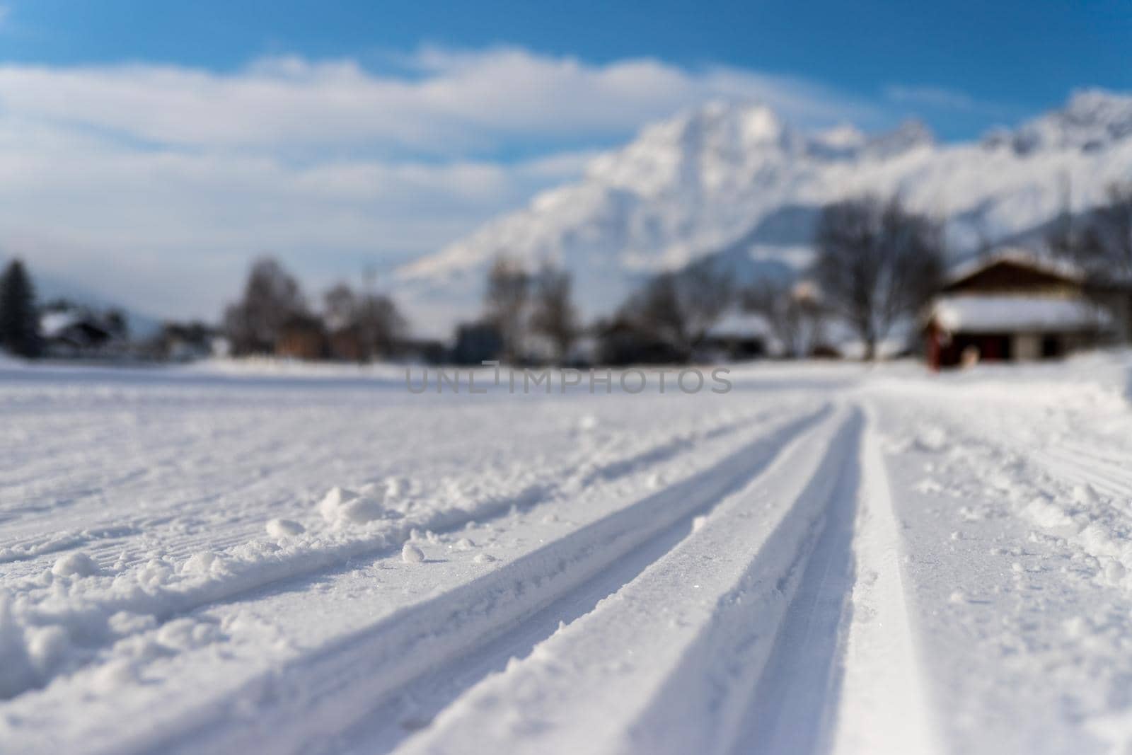 Cross-country skiing slope in Austria, beautiful mountain scenery, blurry background